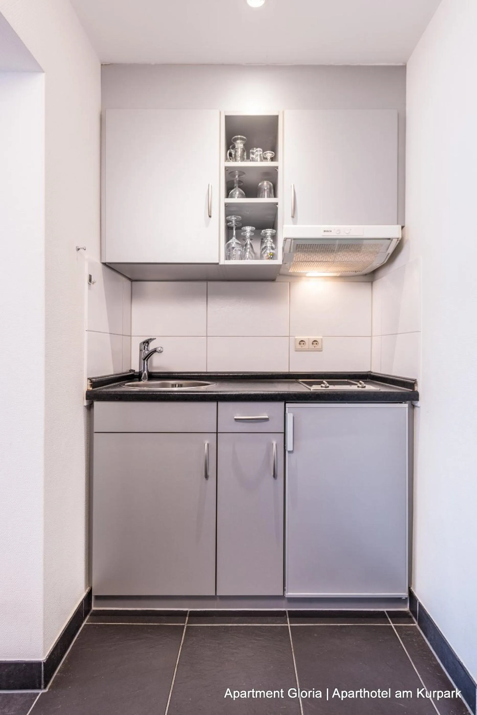 Kitchen or kitchenette in Aparthotel am Kurpark