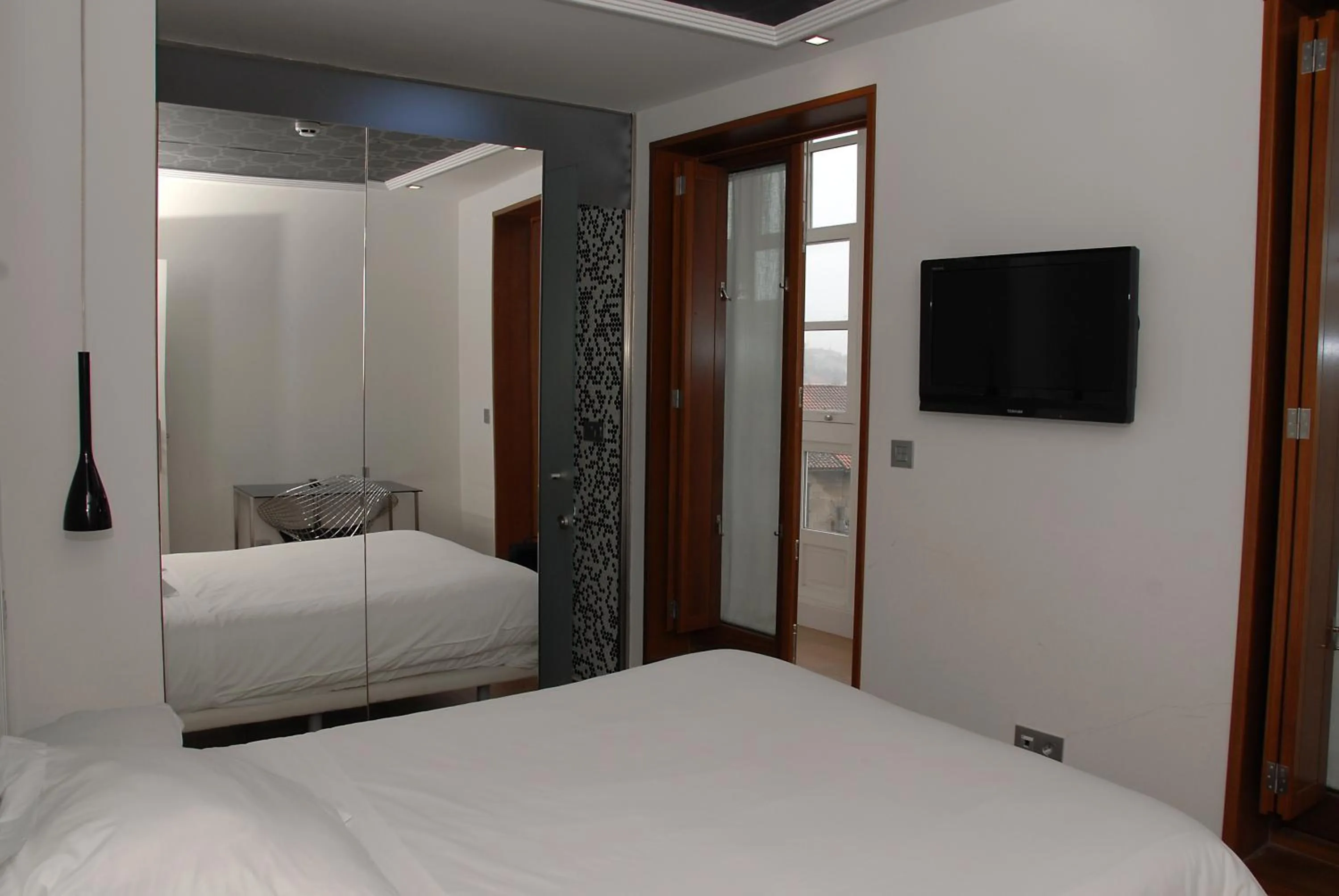 TV and multimedia, Bed in Casas Reais Boutique