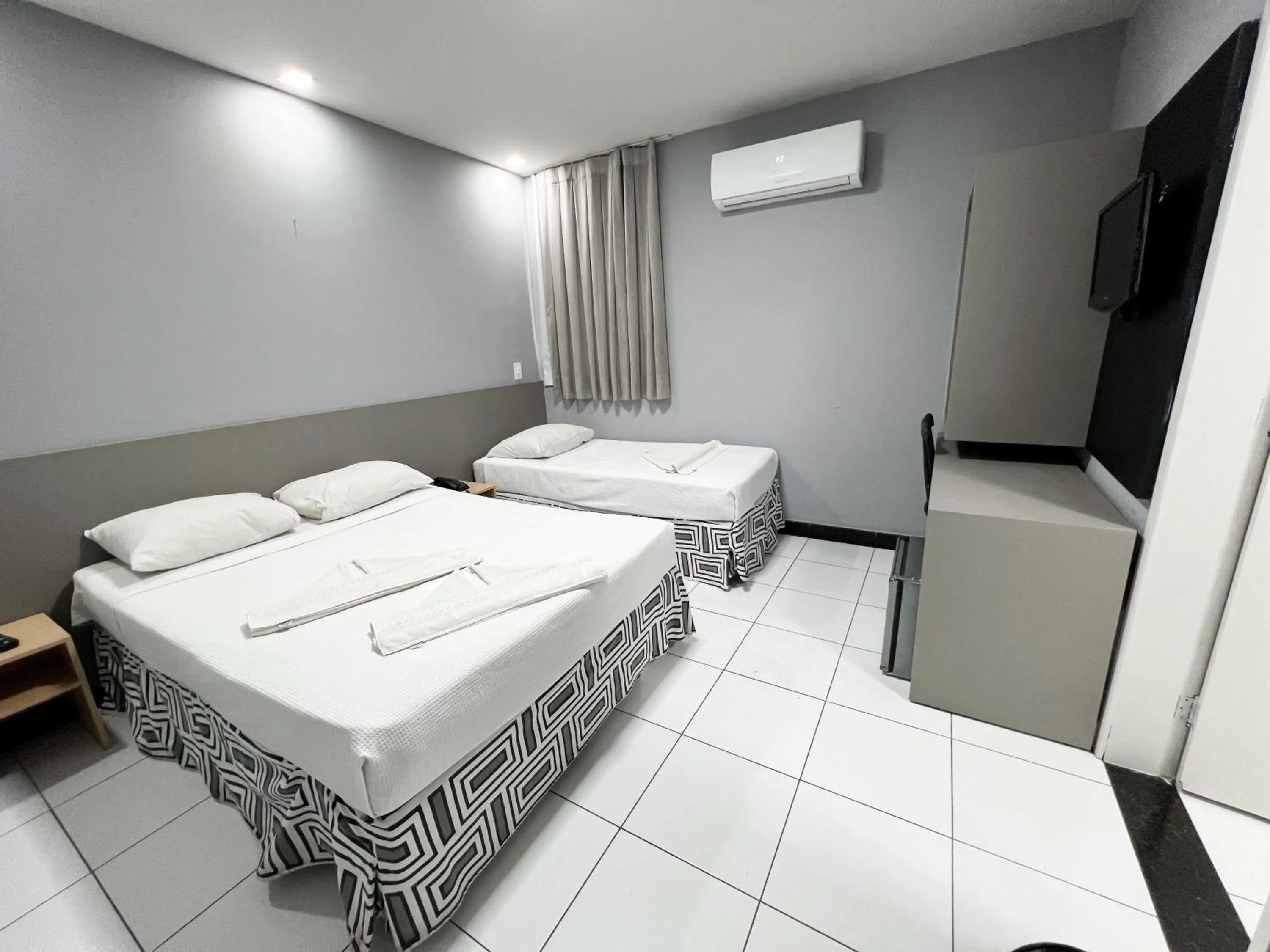 Bed in Ritz Praia Hotel