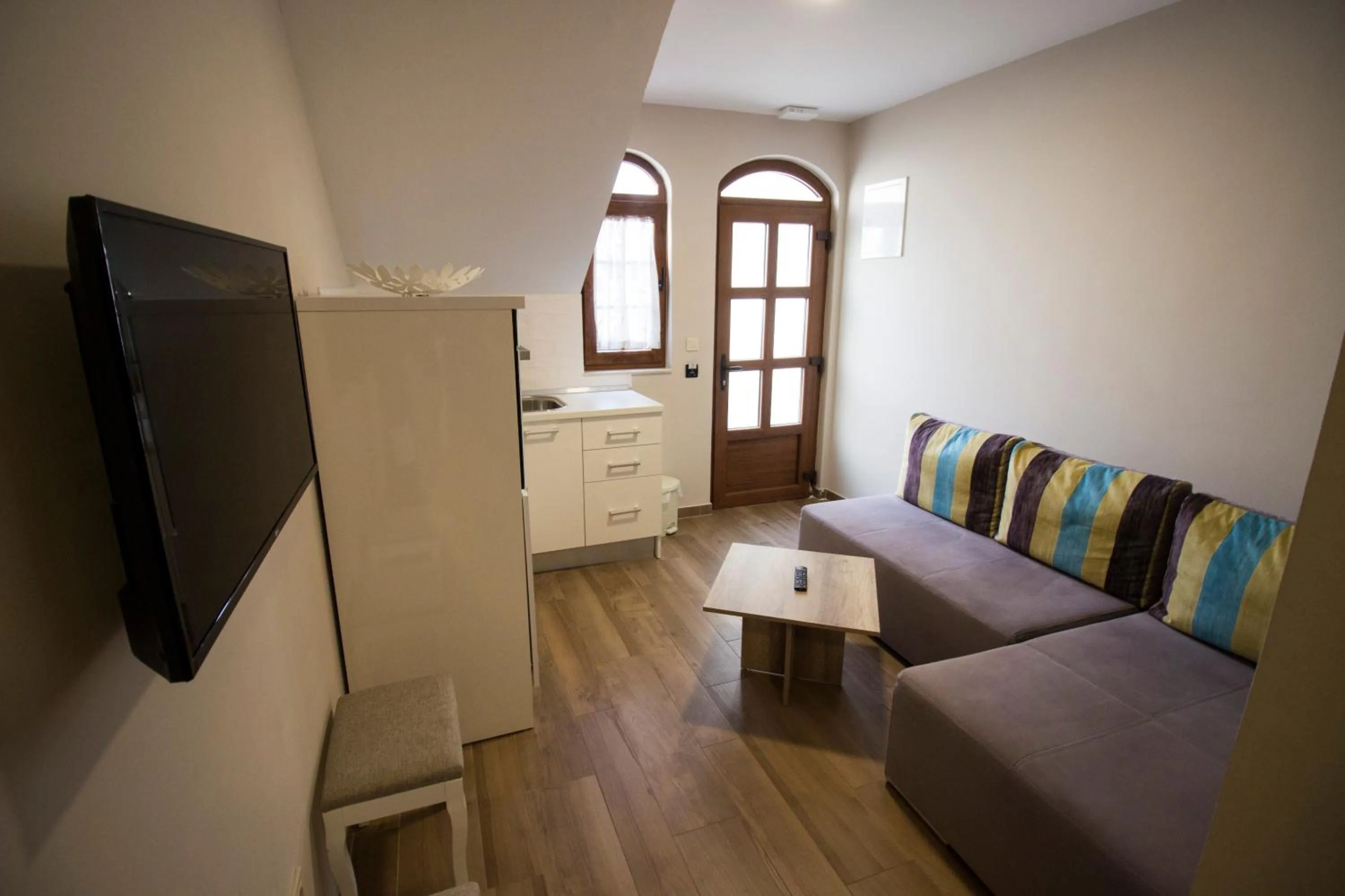 Communal lounge/ TV room in Villa Divani