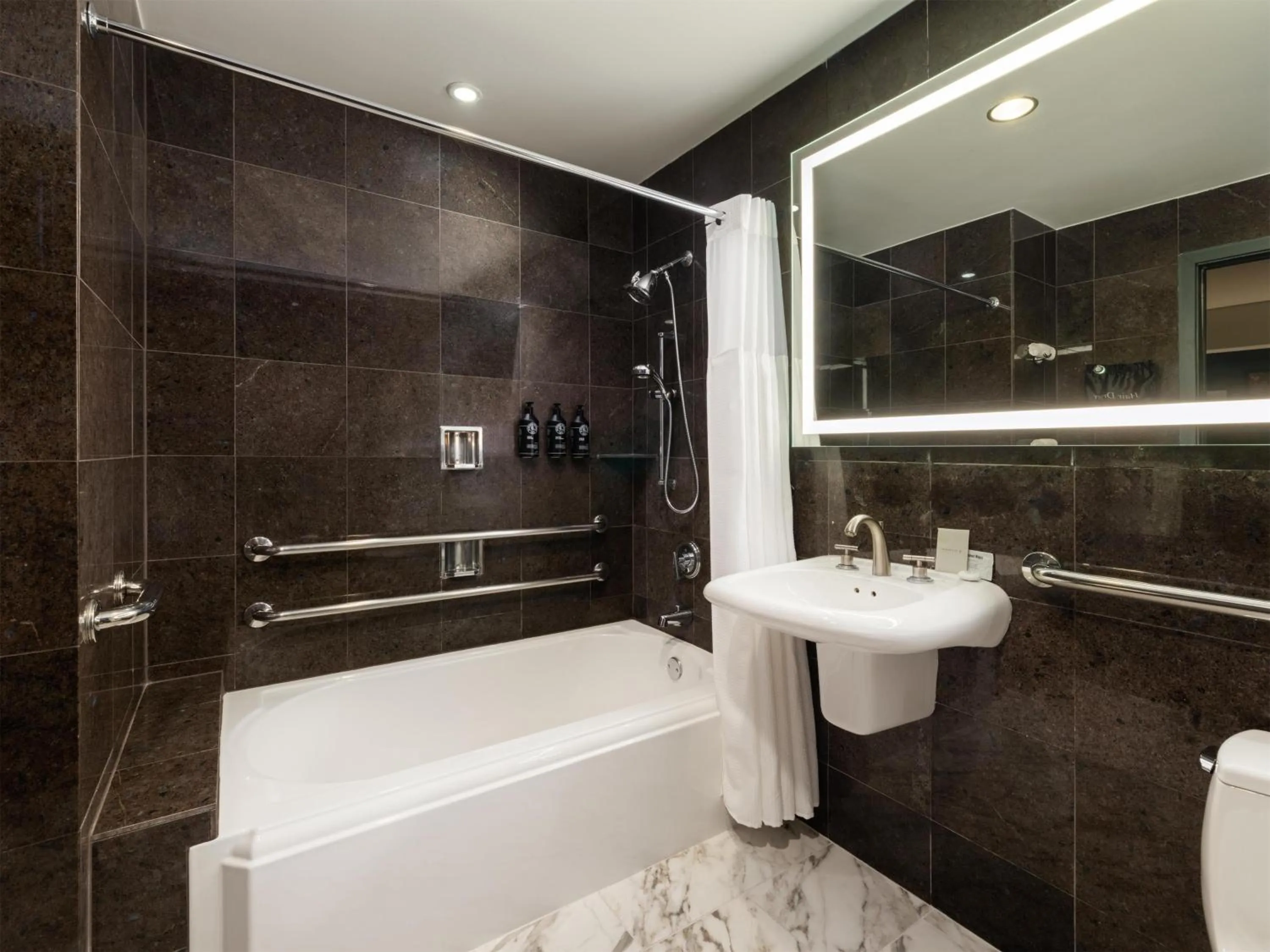 Shower in The Sam Houston, Tapestry Collection by Hilton