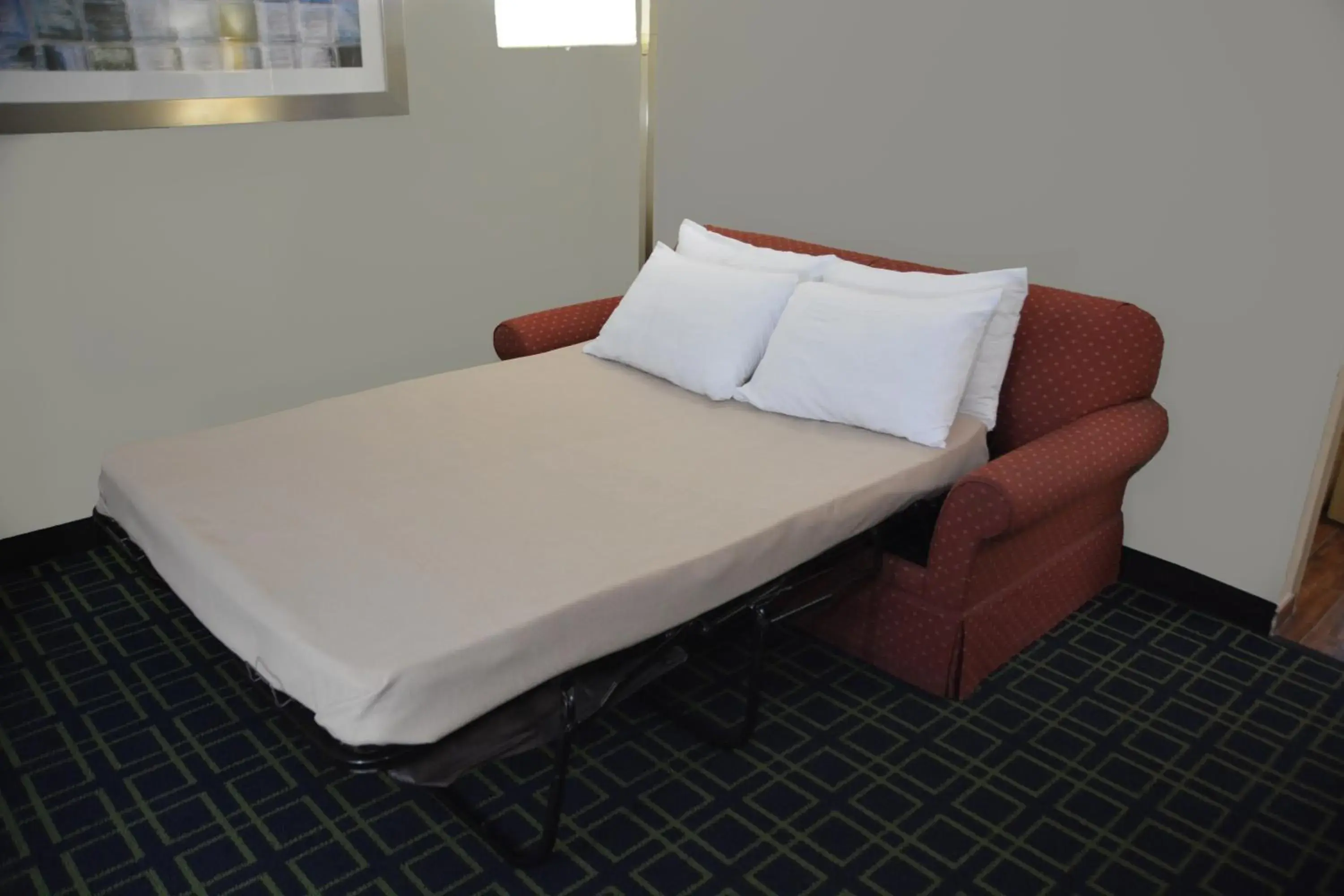 Communal lounge/ TV room, Bed in Quality Inn & Suites