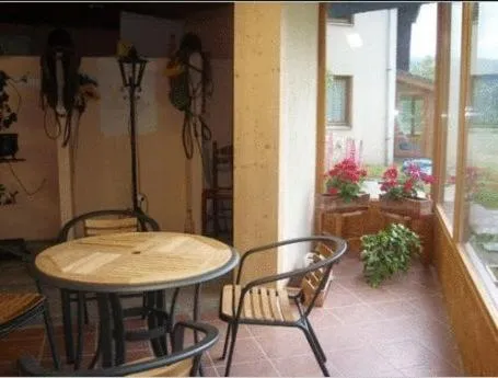 Seating area in Hotel Restaurant Home Des Hautes Vosges
