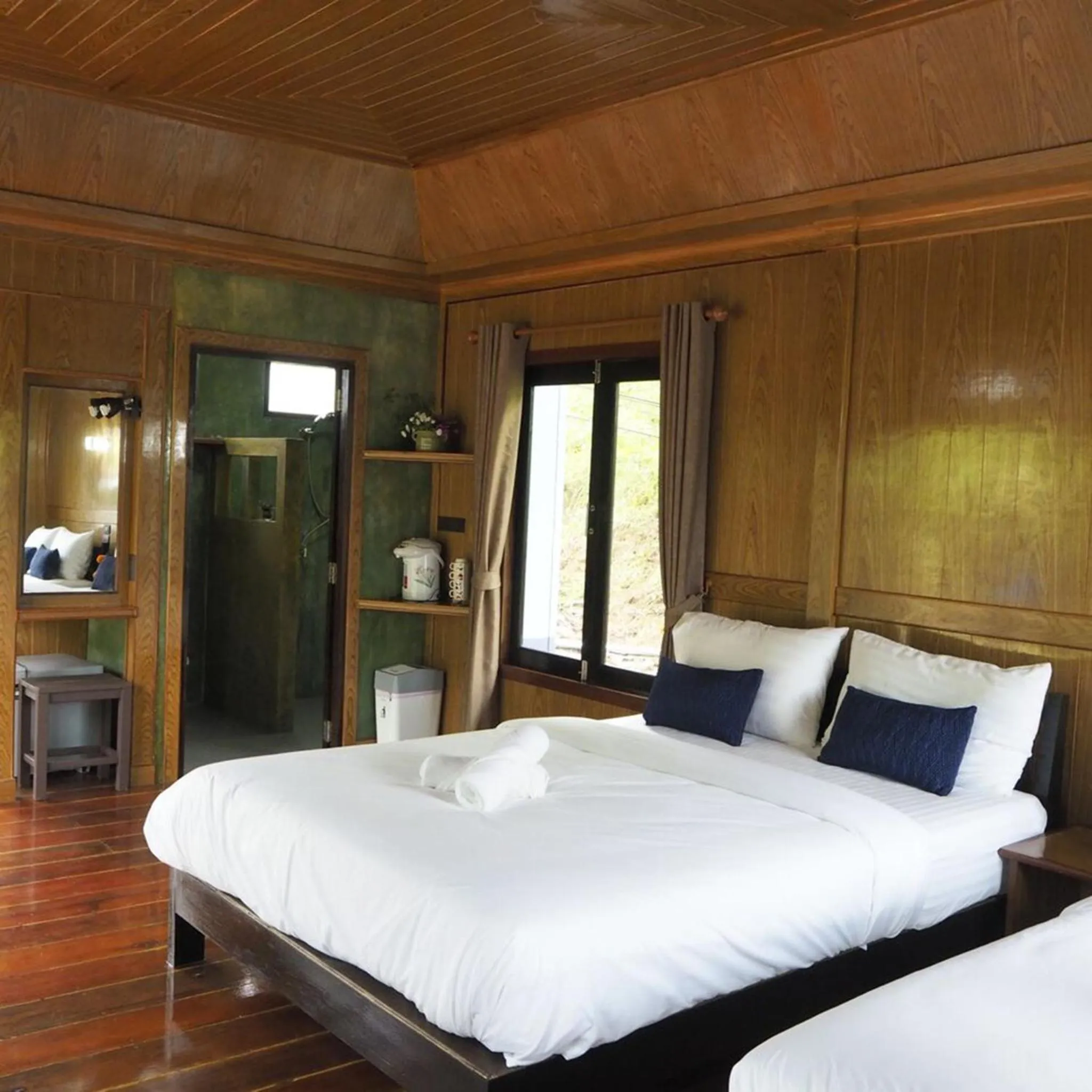 Bed in Baan Suan Hill Resort