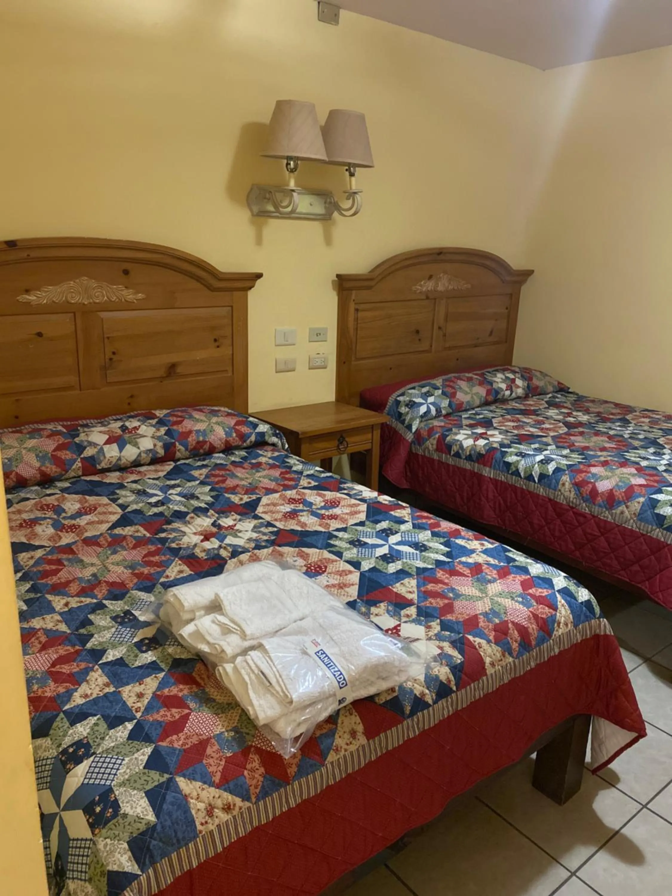 Bed in El Ejecutivo Aparthotel