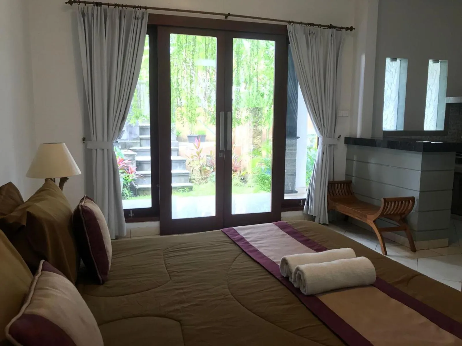 Bed in Surya Guest House Sanur