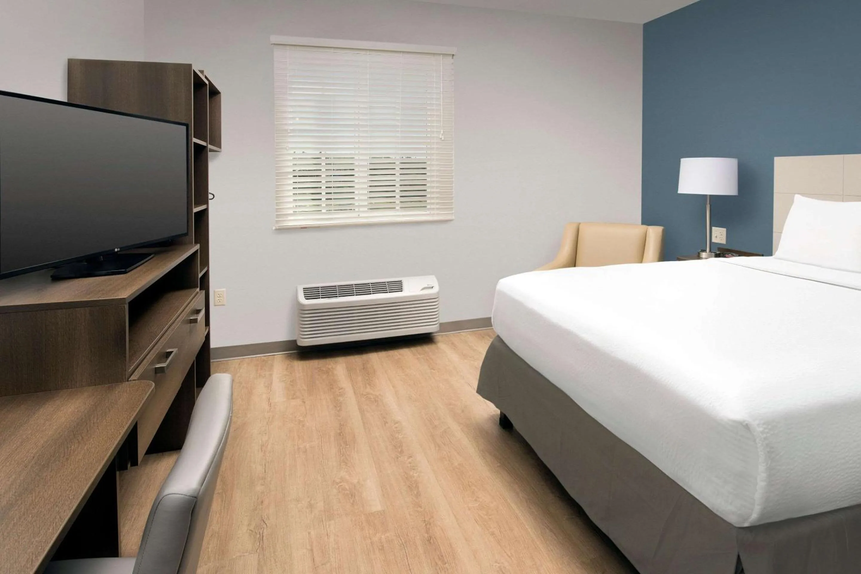 Photo of the whole room, Bed in WoodSpring Suites Miami Southwest