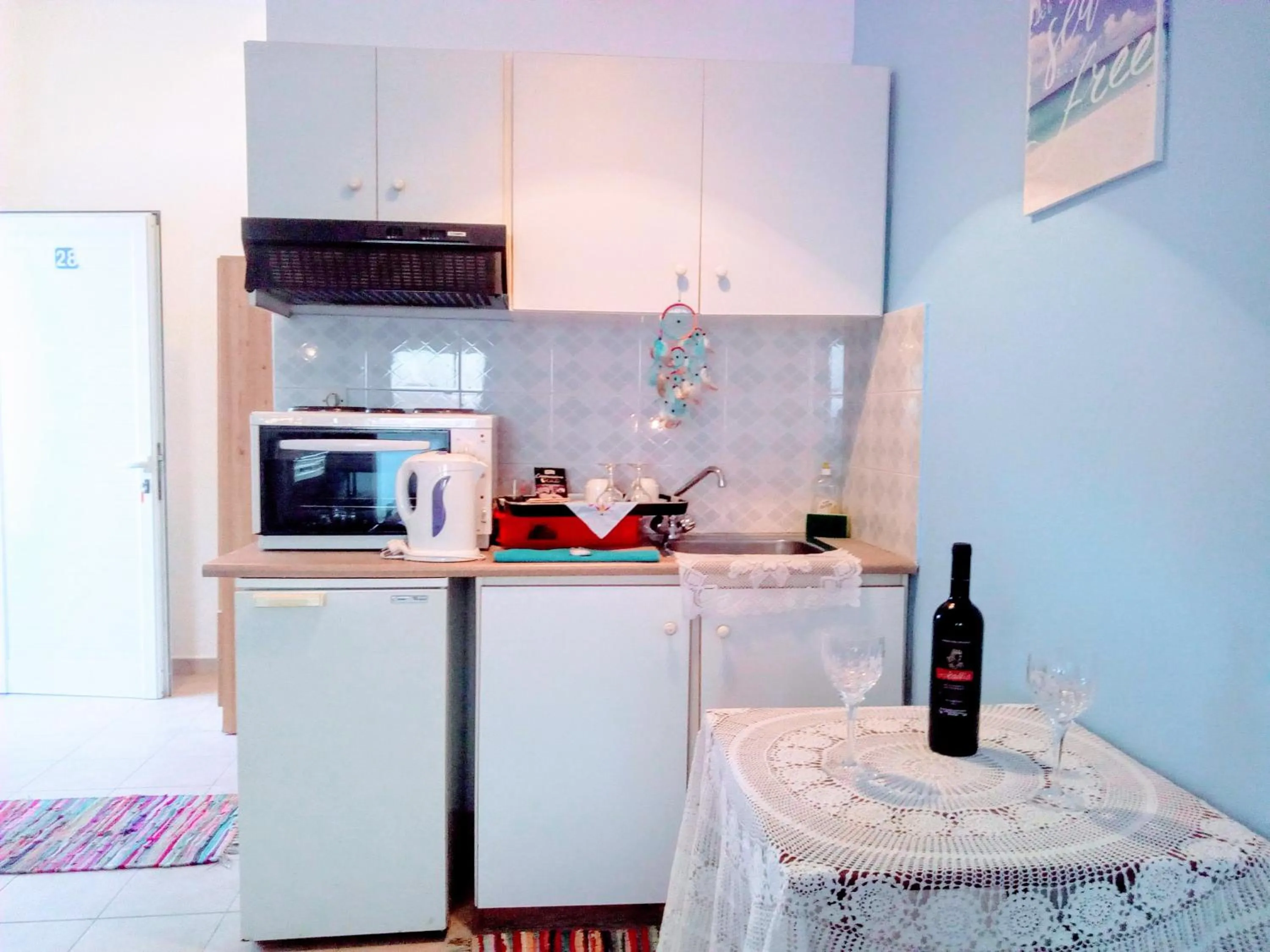 Kitchen or kitchenette in Paradisso Studios