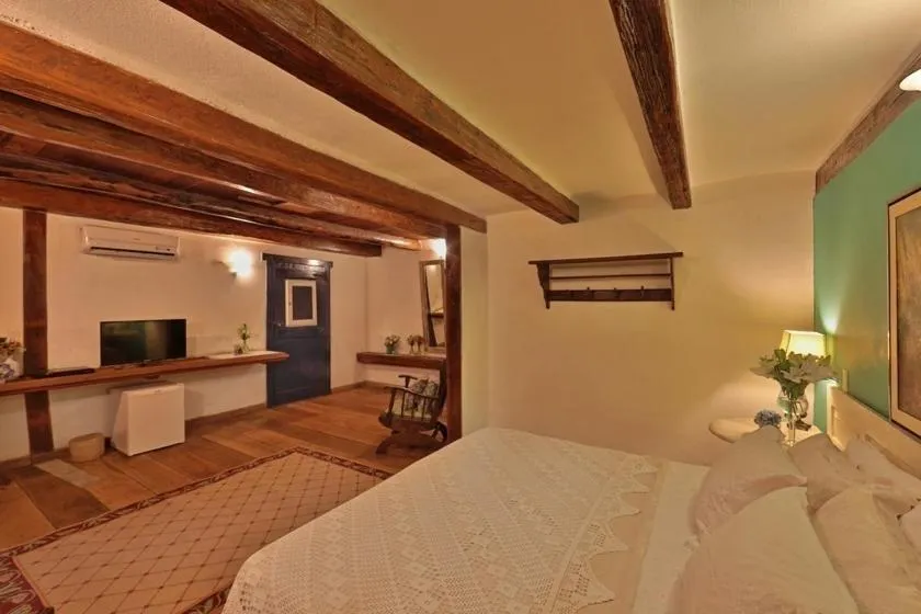 Bed in Pousada do Amparo