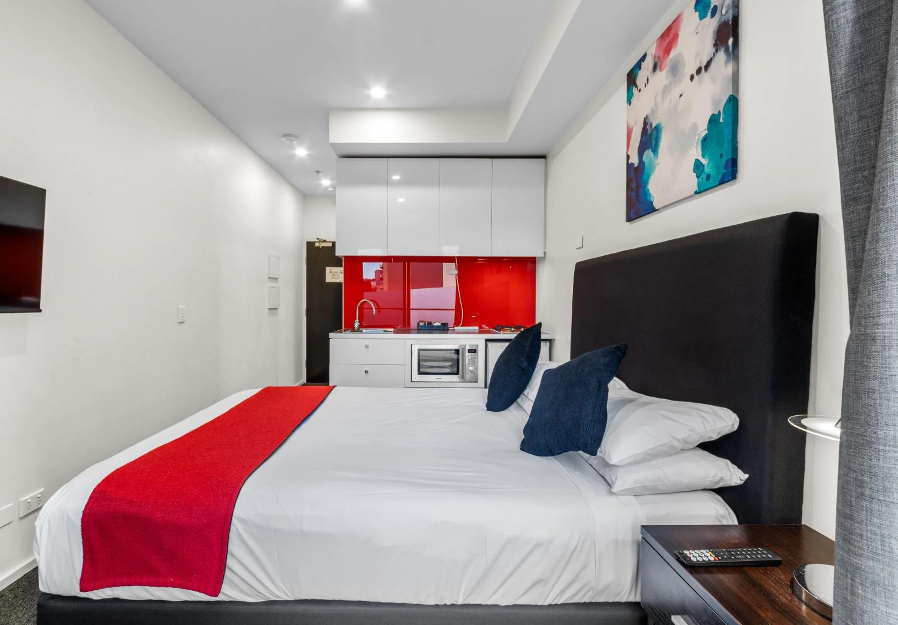 Bed in Comfort Apartments on Elizabeth