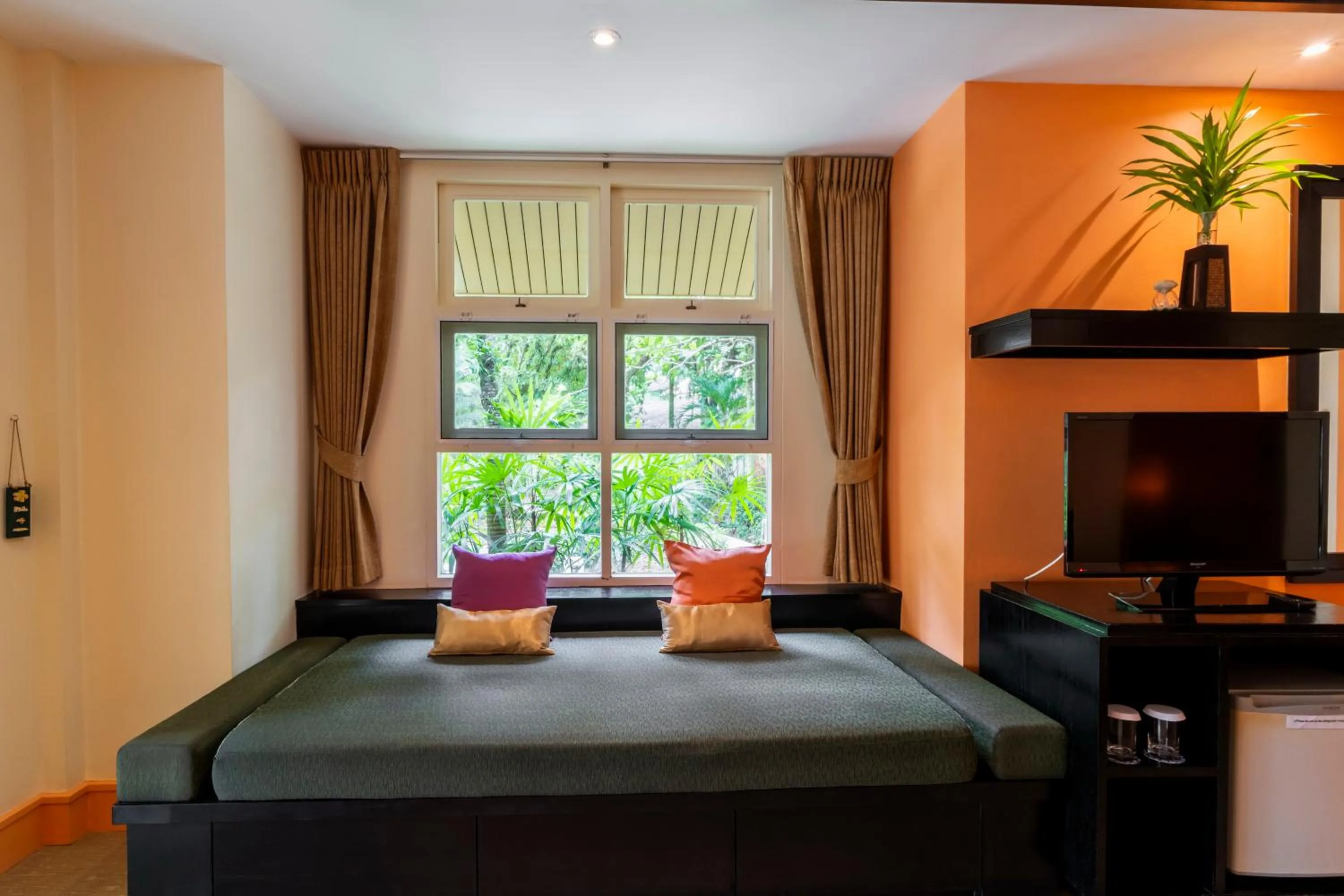 Seating area, Bed in Baan Khaolak Beach Resort