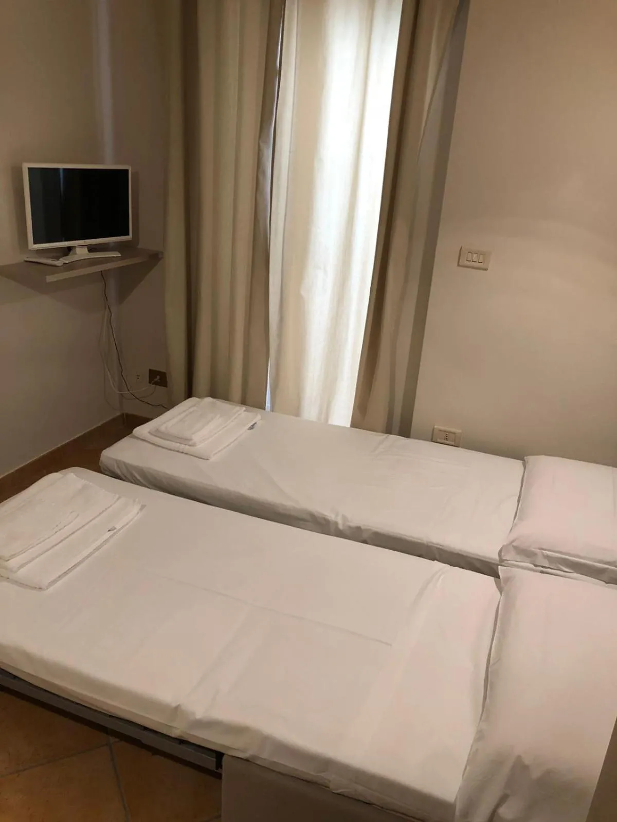 Bed in A DUE PASSI temporary apartment