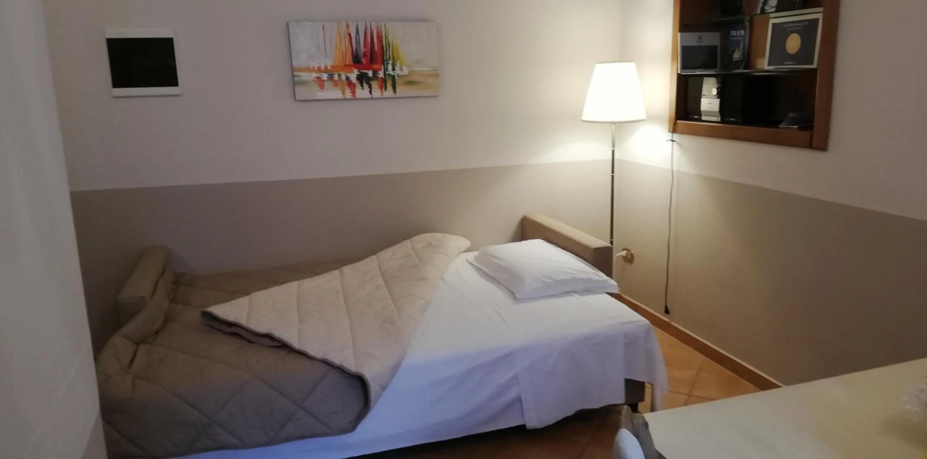 Bed in A DUE PASSI temporary apartment
