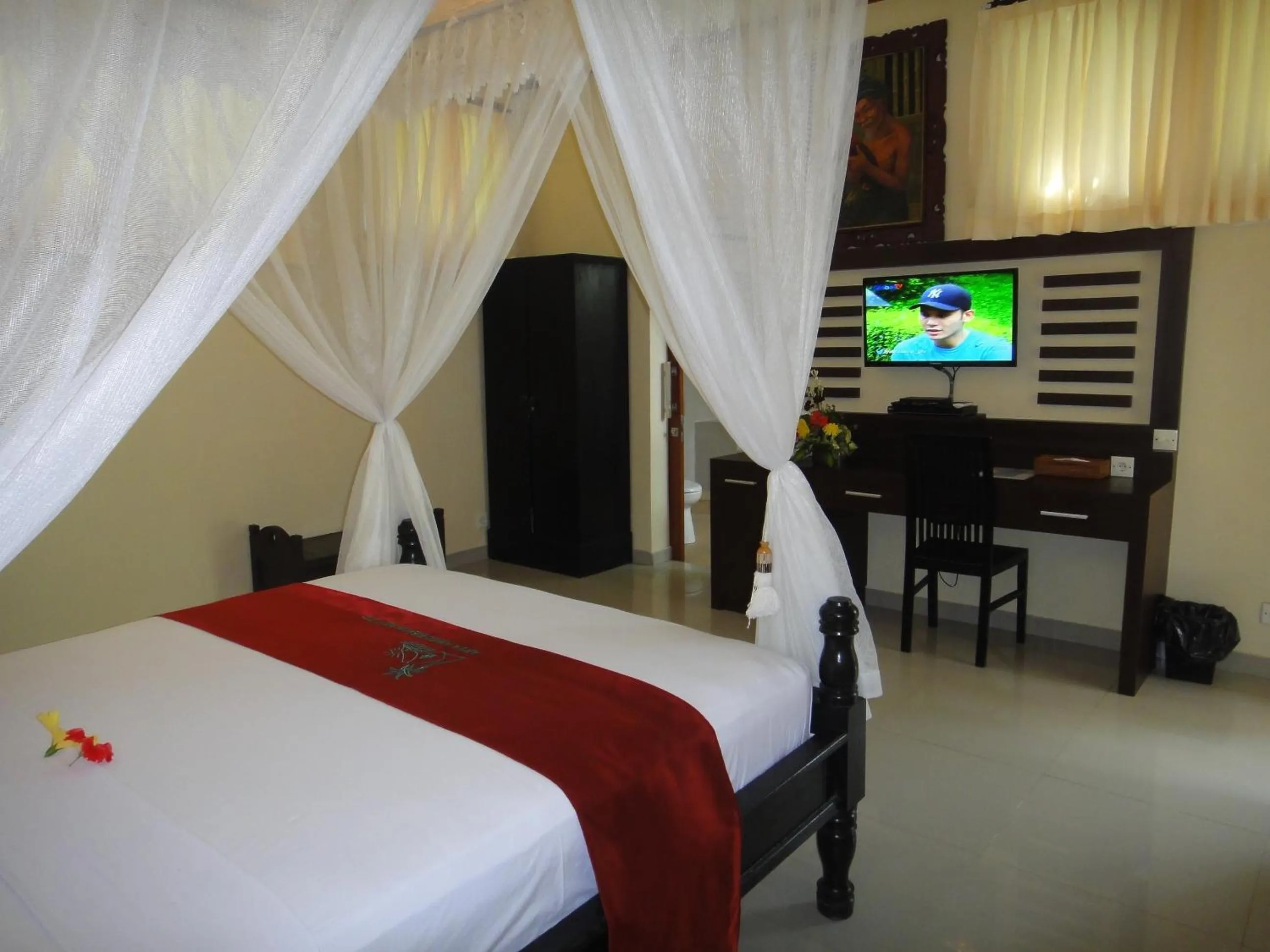 TV and multimedia, Bed in Arya Amed Beach Resort and Dive Center