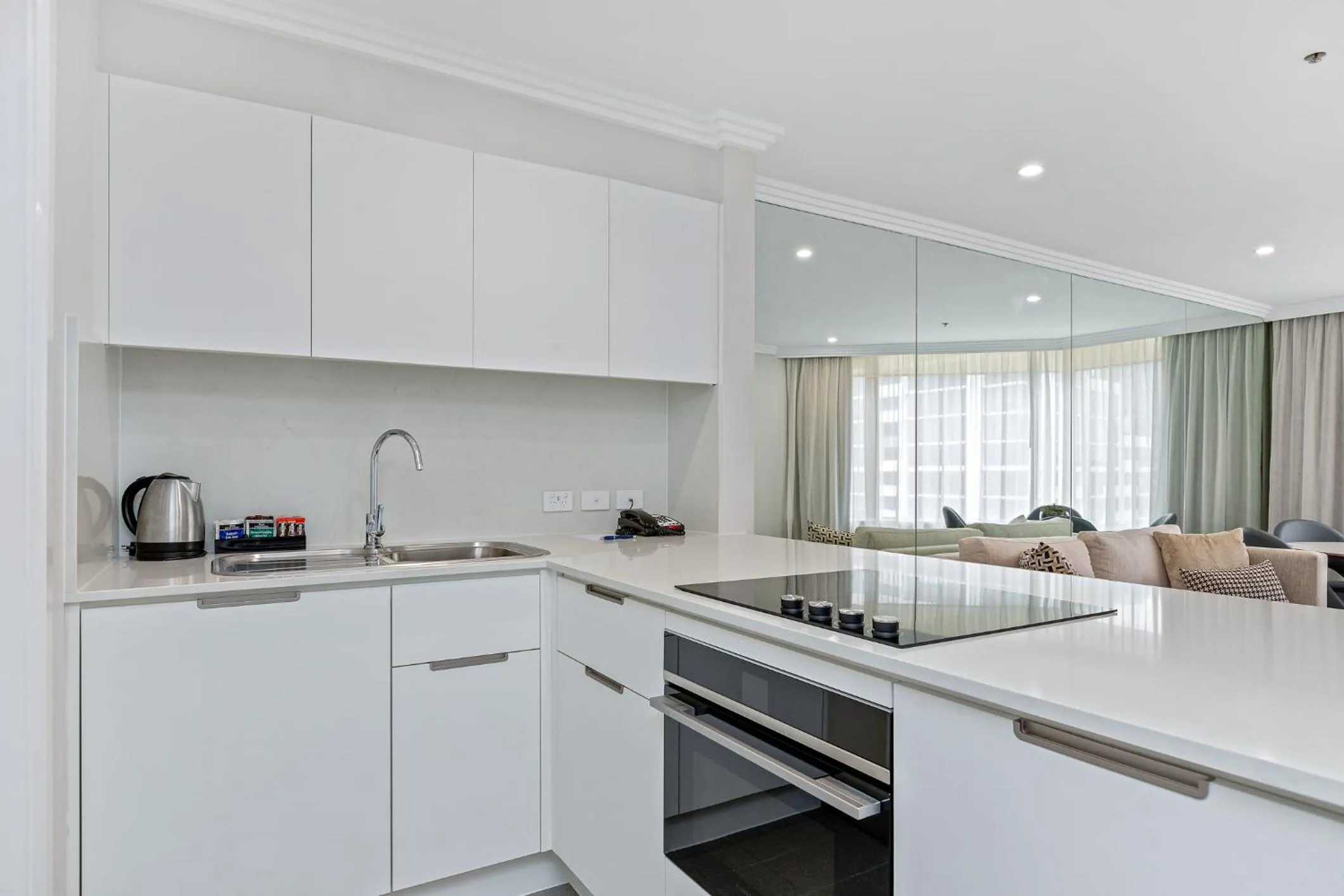 Kitchen or kitchenette in The Sebel Quay West Suites Sydney