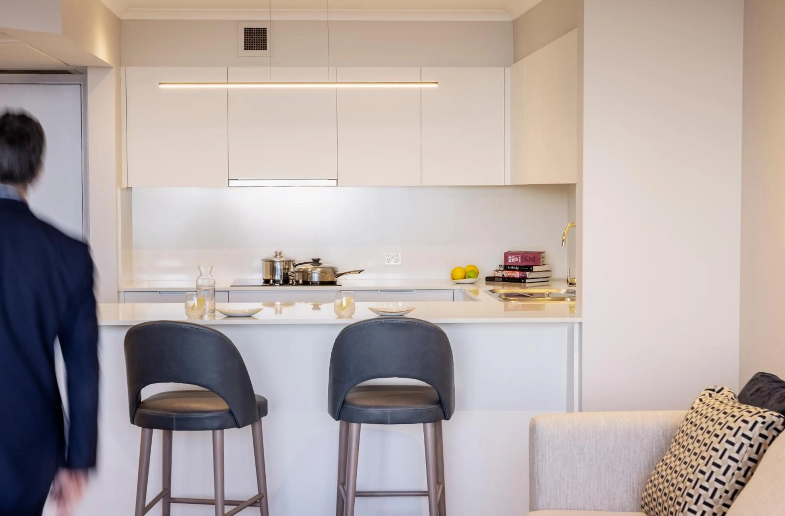 Kitchen or kitchenette in The Sebel Quay West Suites Sydney