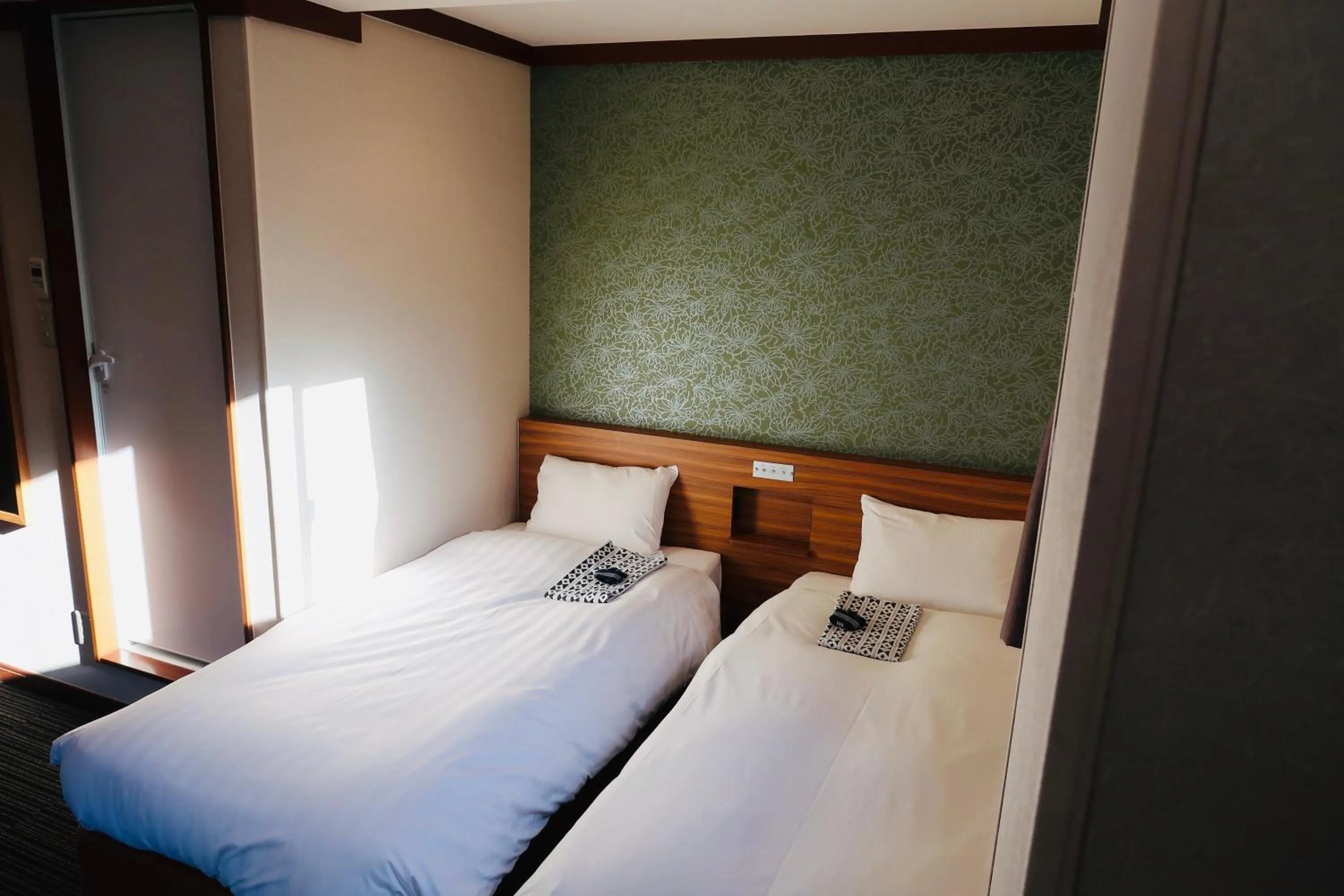 Bed in Ueno Touganeya Hotel