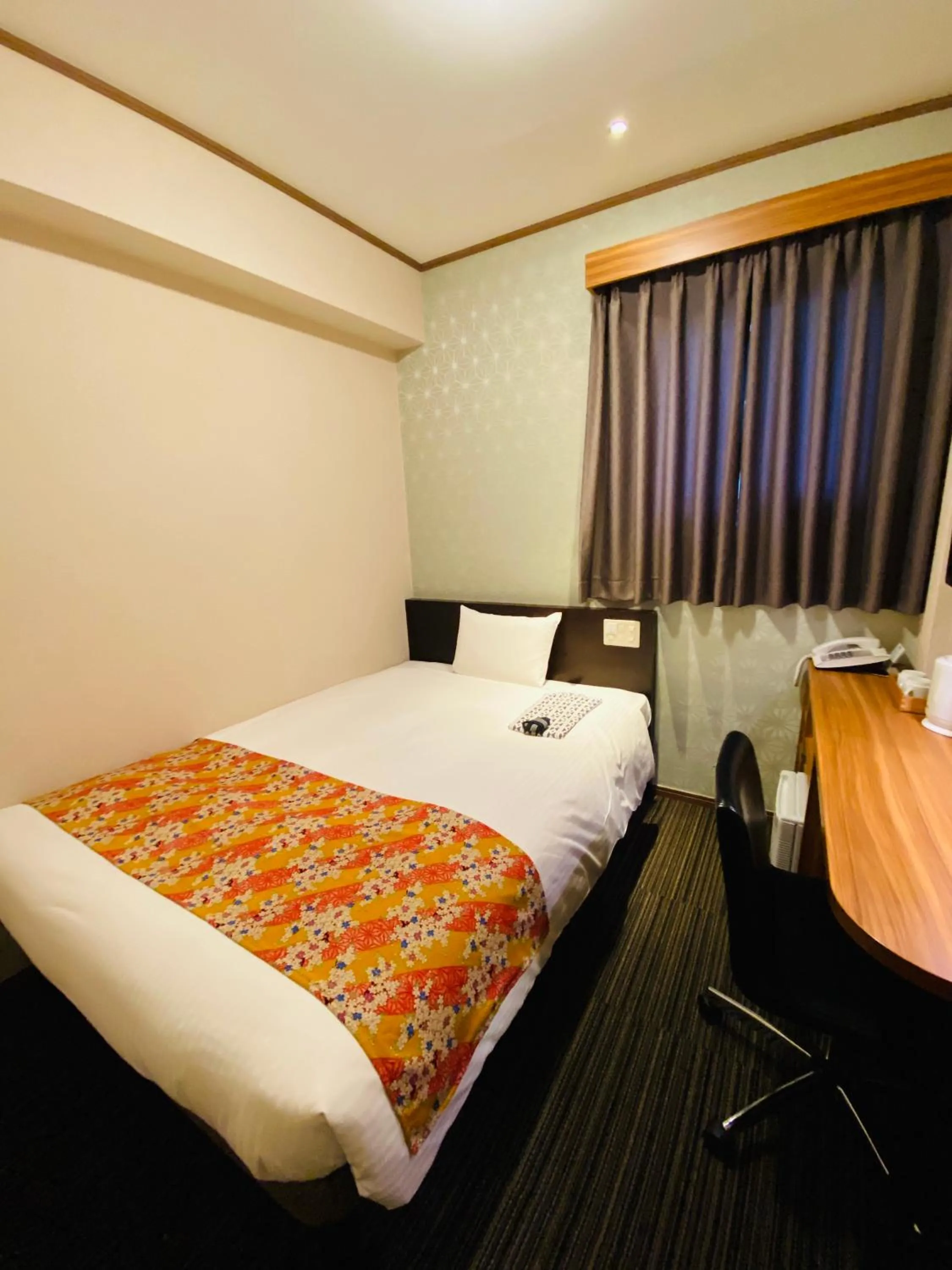 Bed in Ueno Touganeya Hotel