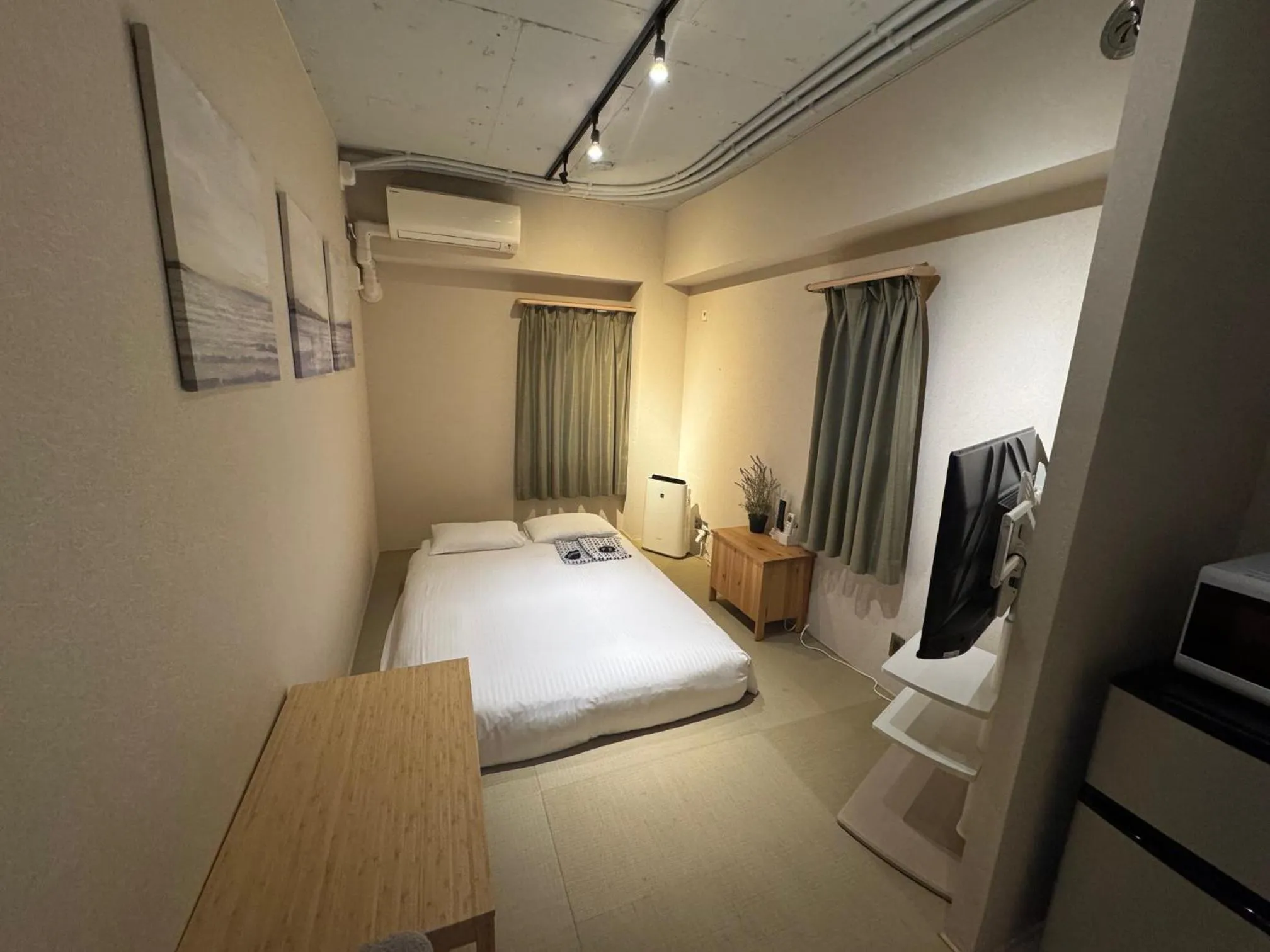 Bed in Ueno Touganeya Hotel