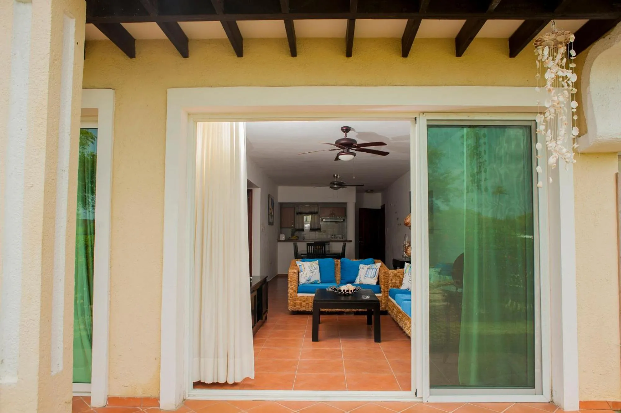 Communal lounge/ TV room in Cocotal Bavaro Apartments