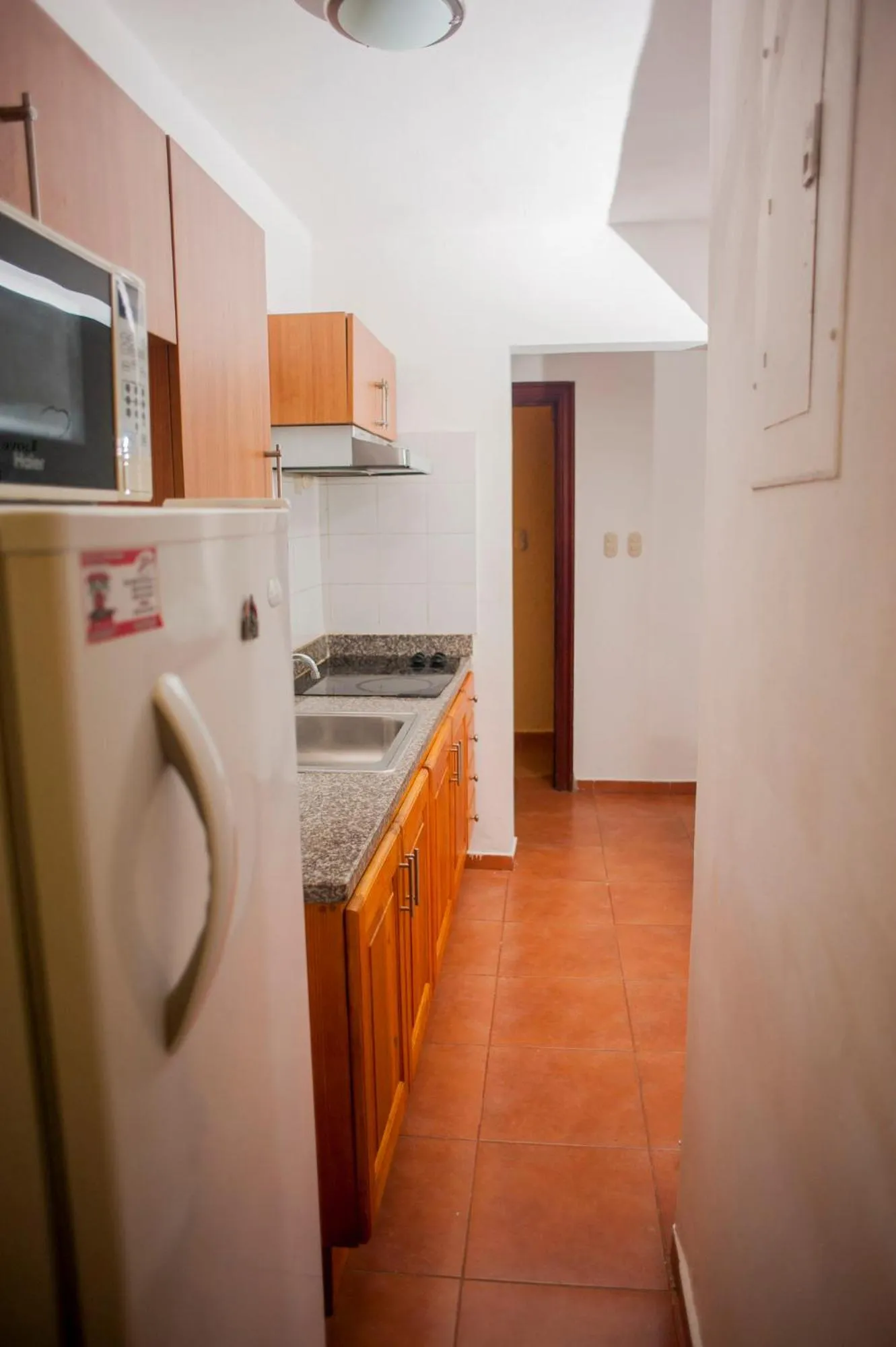 Kitchen or kitchenette in Cocotal Bavaro Apartments