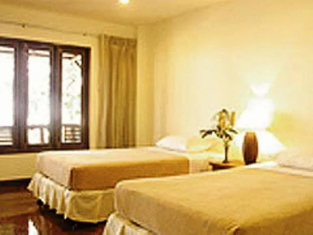 Bed in Baan Klang Aow Beach Resort