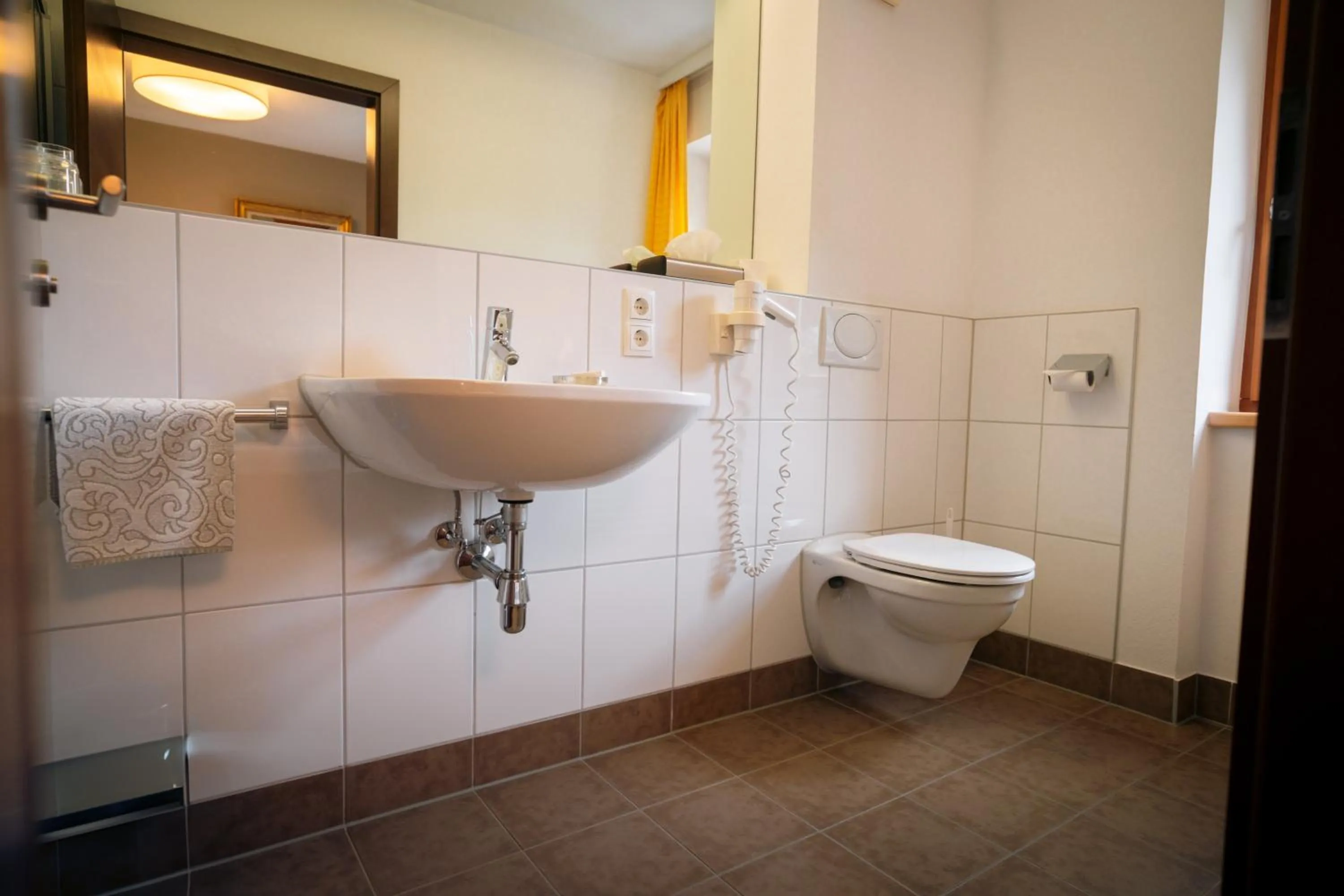 Toilet in Apart-Garni Innerwiesn