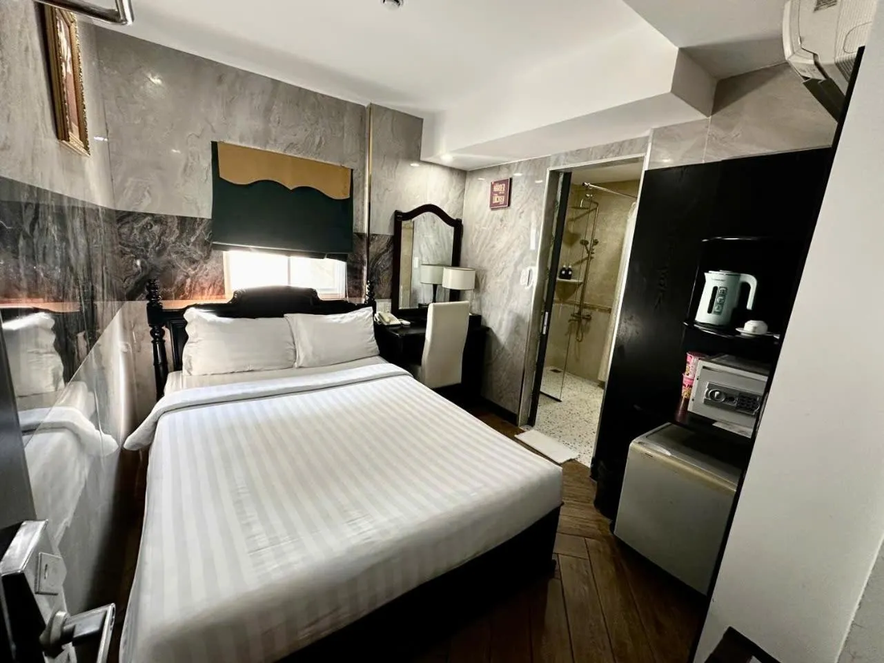 Bed in Sunrise Central Hotel