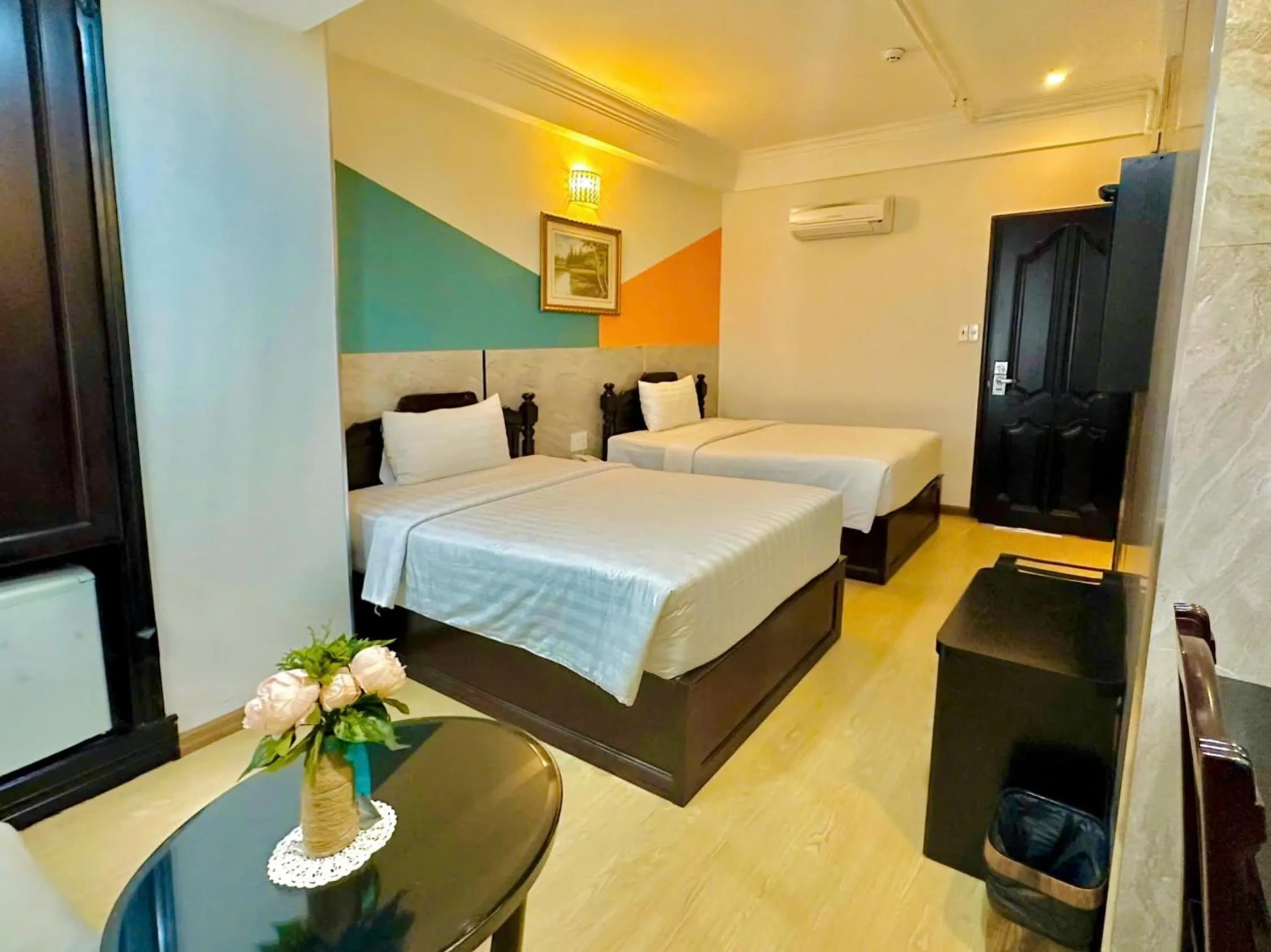 Bed in Sunrise Central Hotel