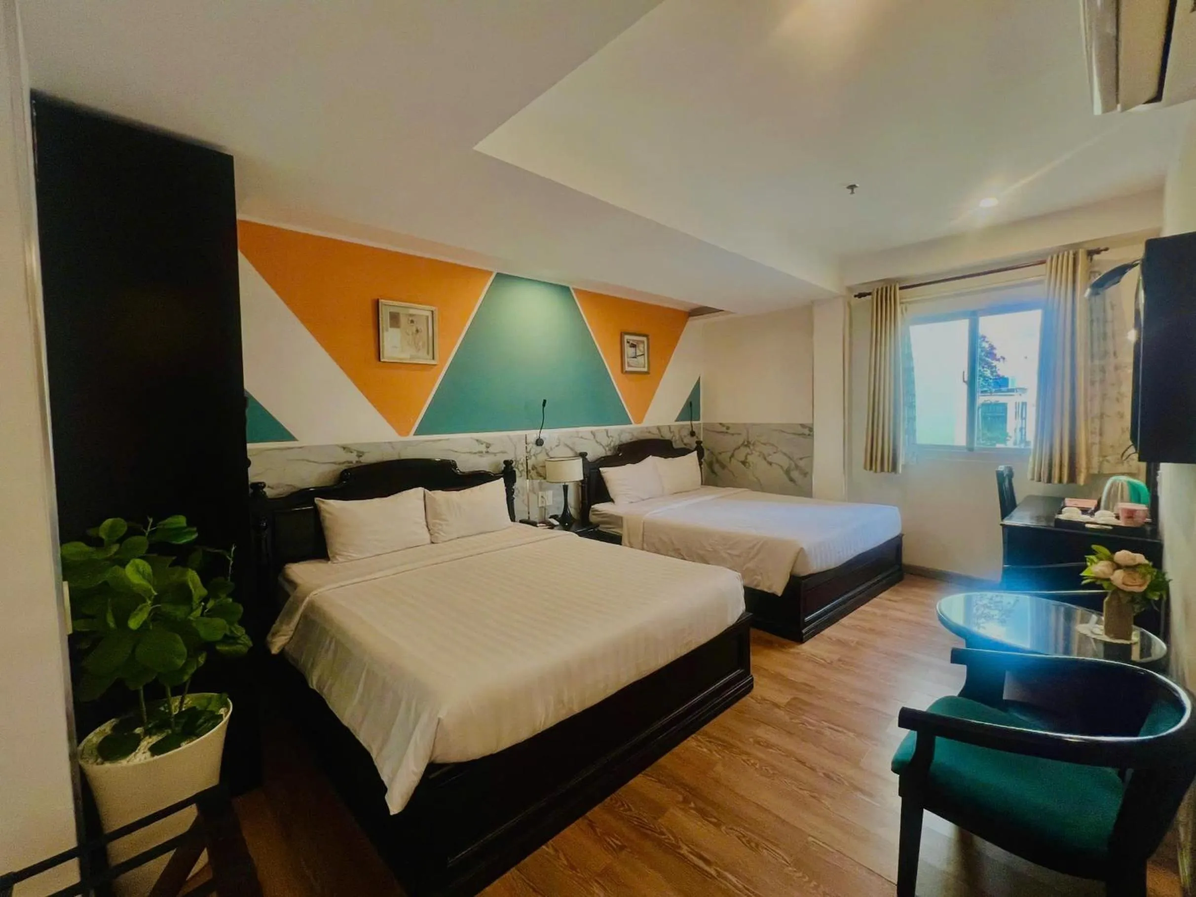 Bed in Sunrise Central Hotel