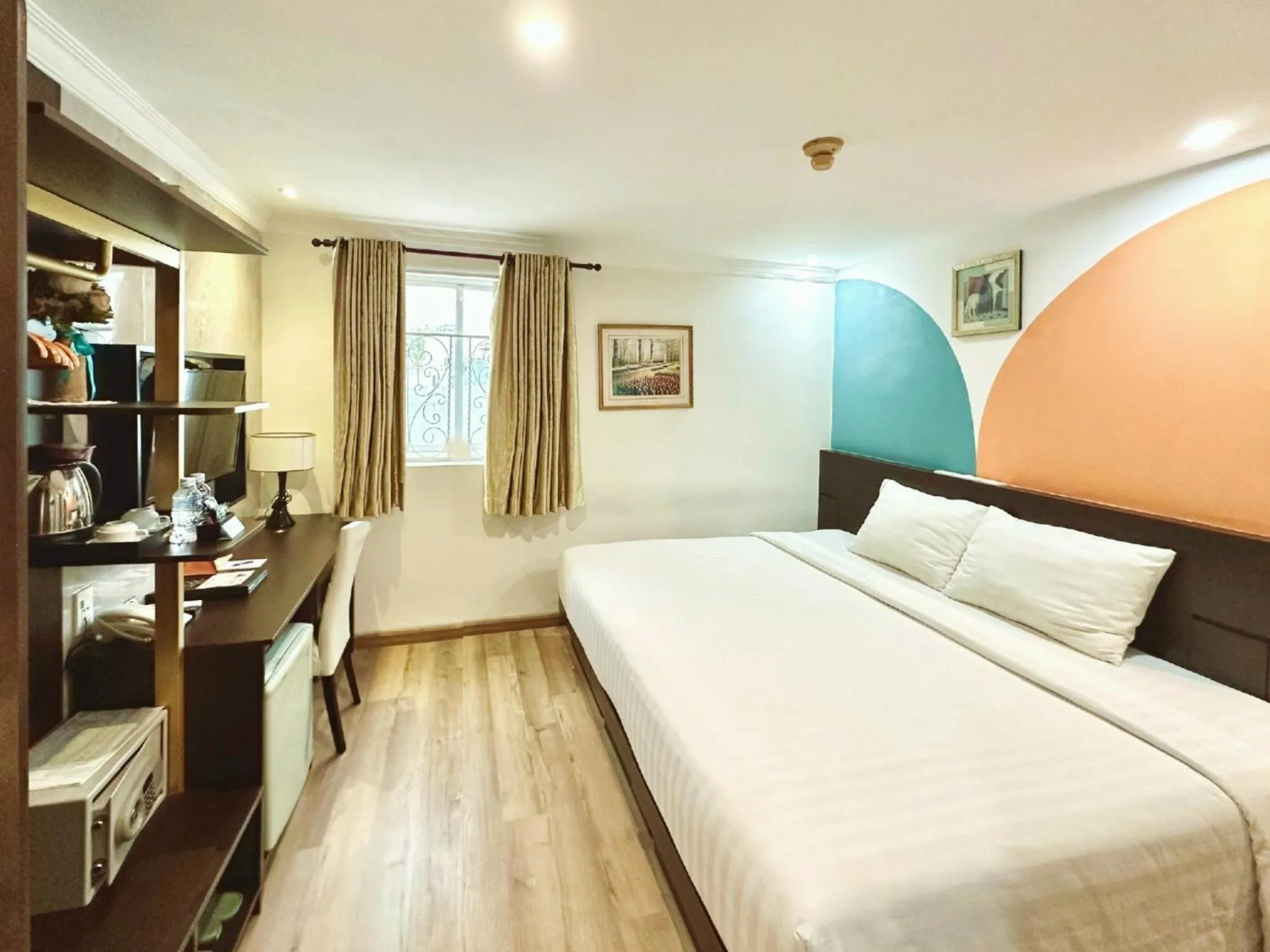 Bed in Sunrise Central Hotel