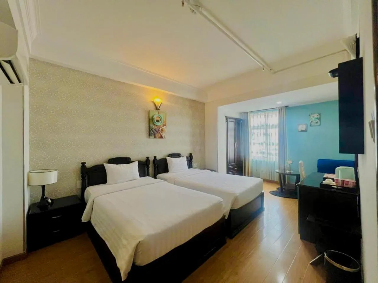 Bed in Sunrise Central Hotel