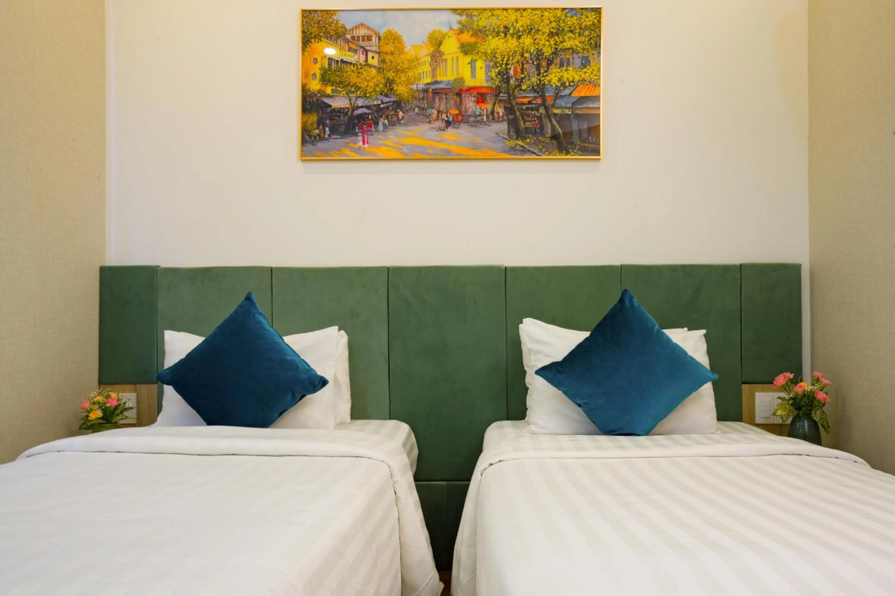 Bed in Sunrise Central Hotel