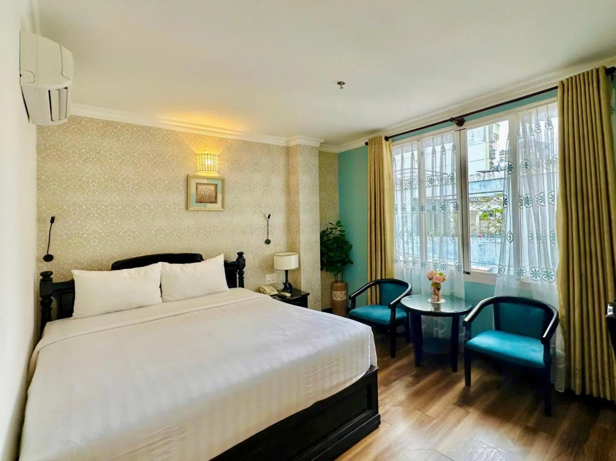 Bed in Sunrise Central Hotel