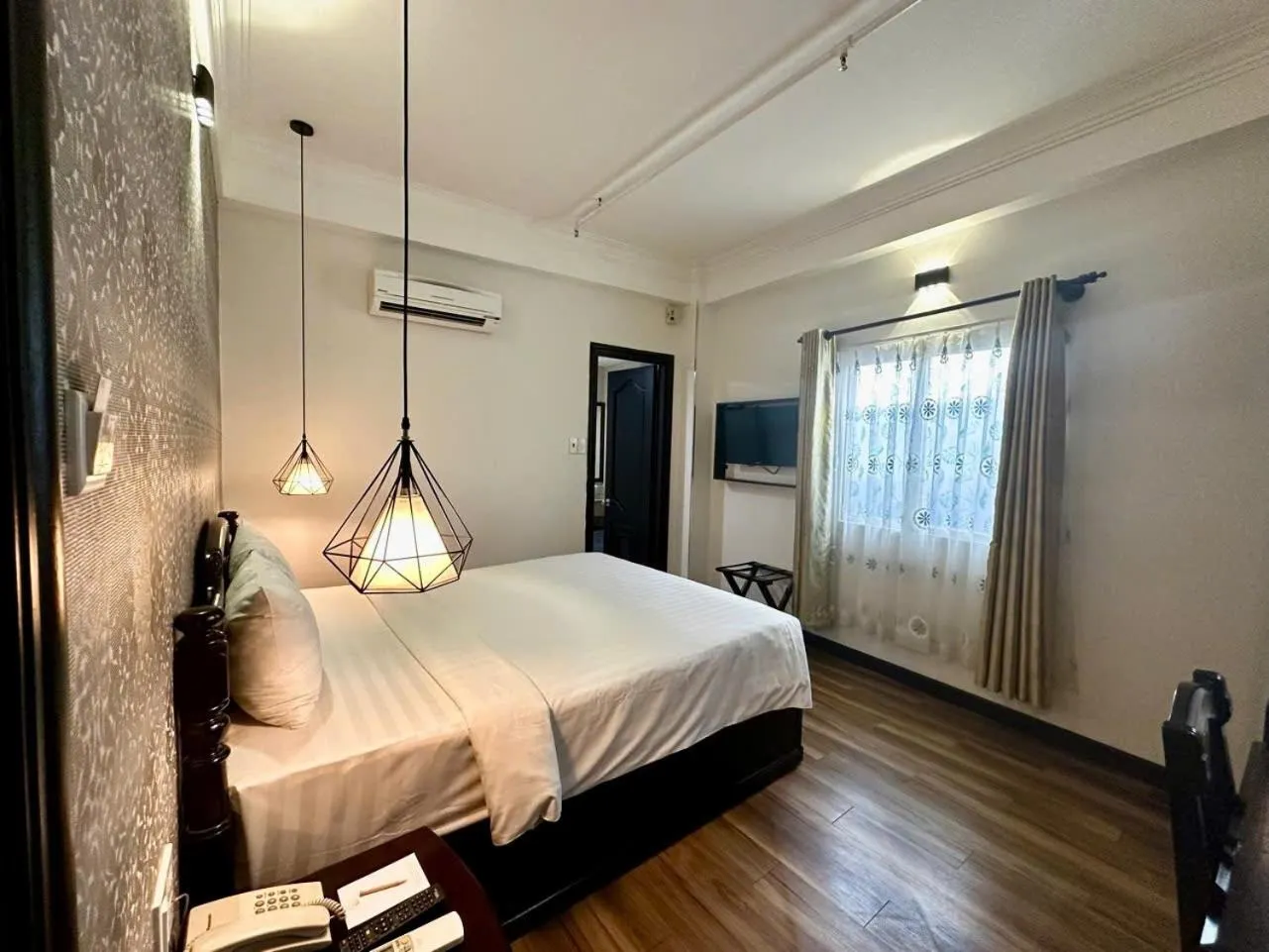 Bed in Sunrise Central Hotel