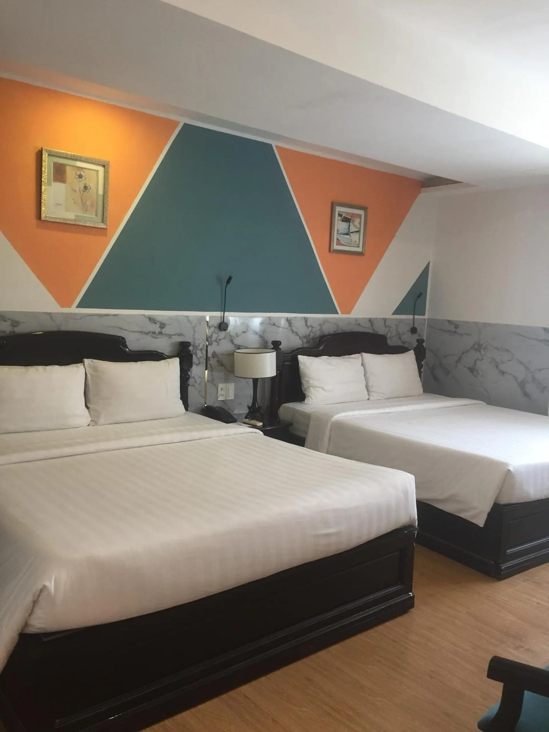 Bed in Sunrise Central Hotel