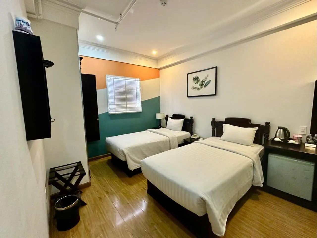 Bed in Sunrise Central Hotel