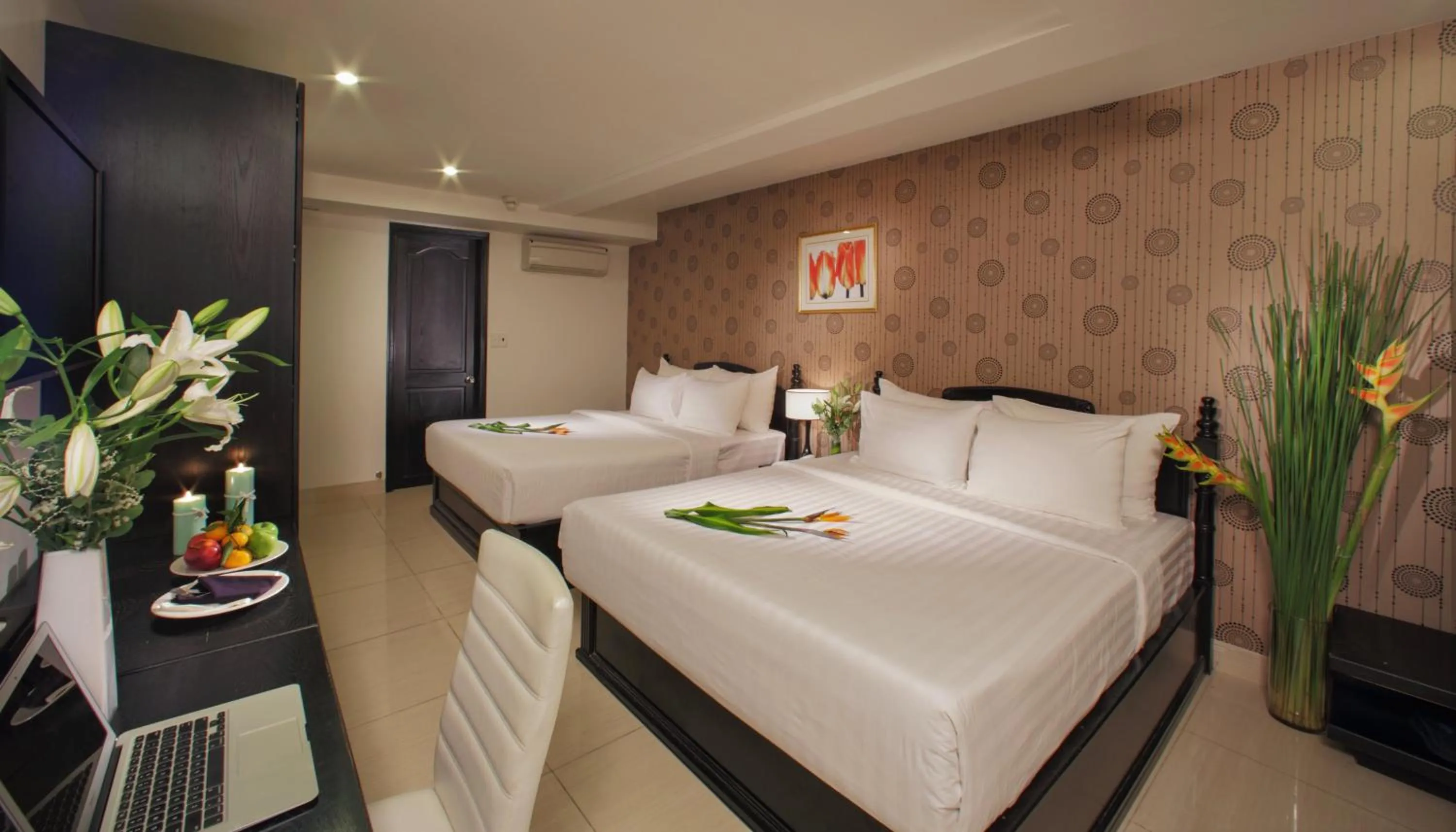 Bed in Sunrise Central Hotel