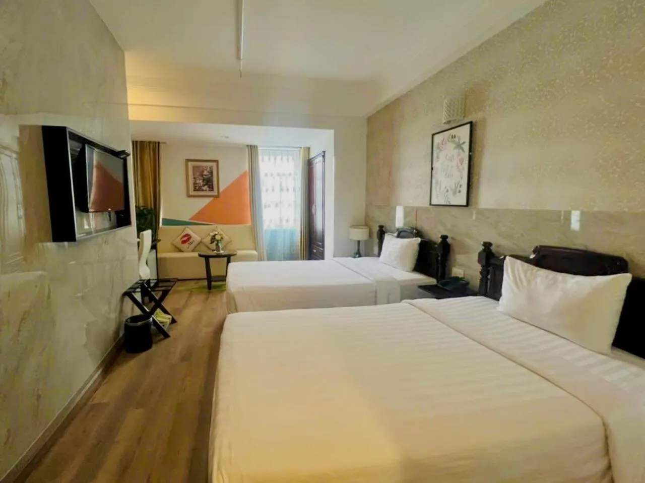 Bed in Sunrise Central Hotel