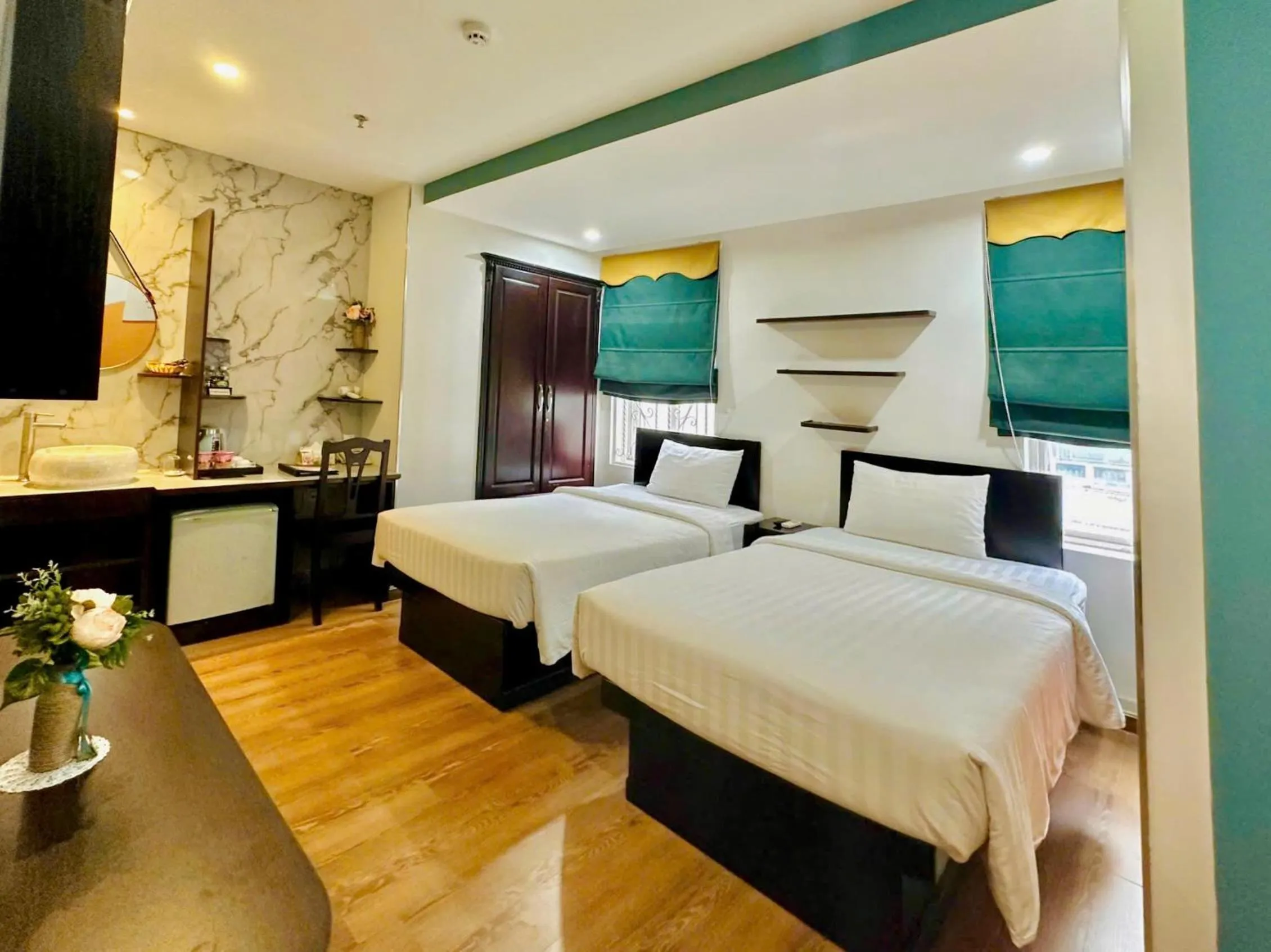 Bed in Sunrise Central Hotel