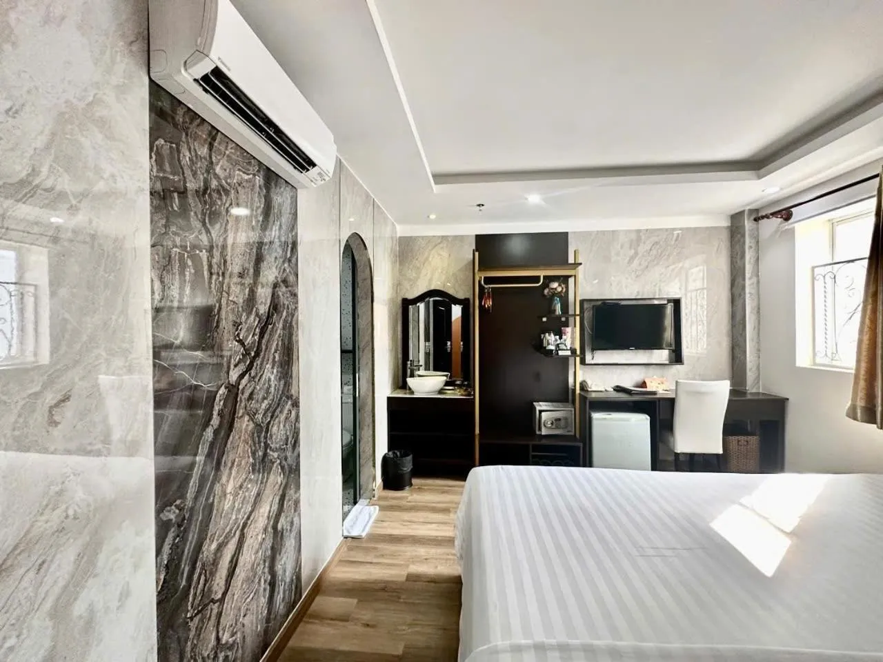 Bed in Sunrise Central Hotel