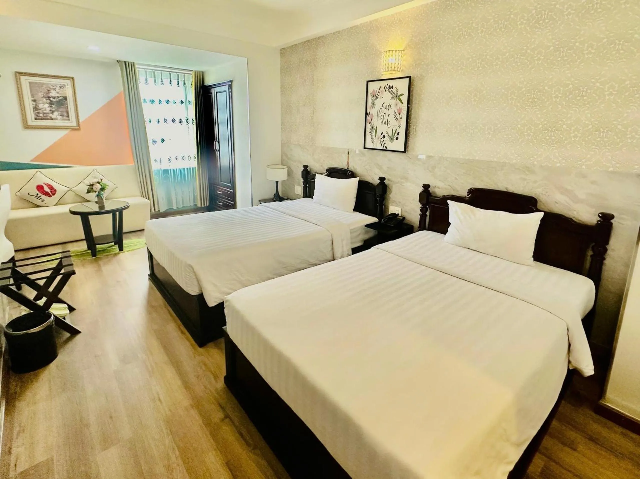 Bed in Sunrise Central Hotel