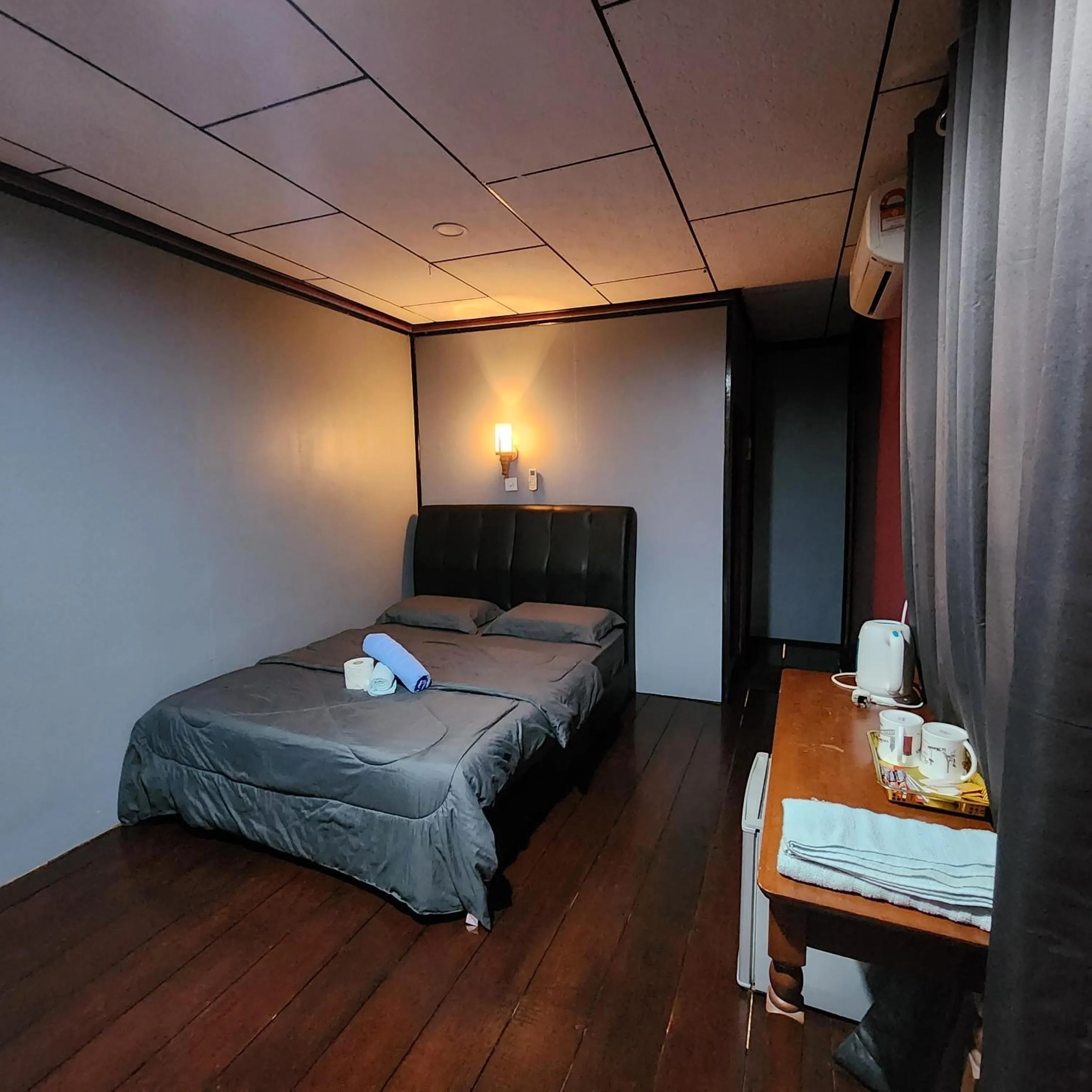 Bed in Permai Chalet Tioman