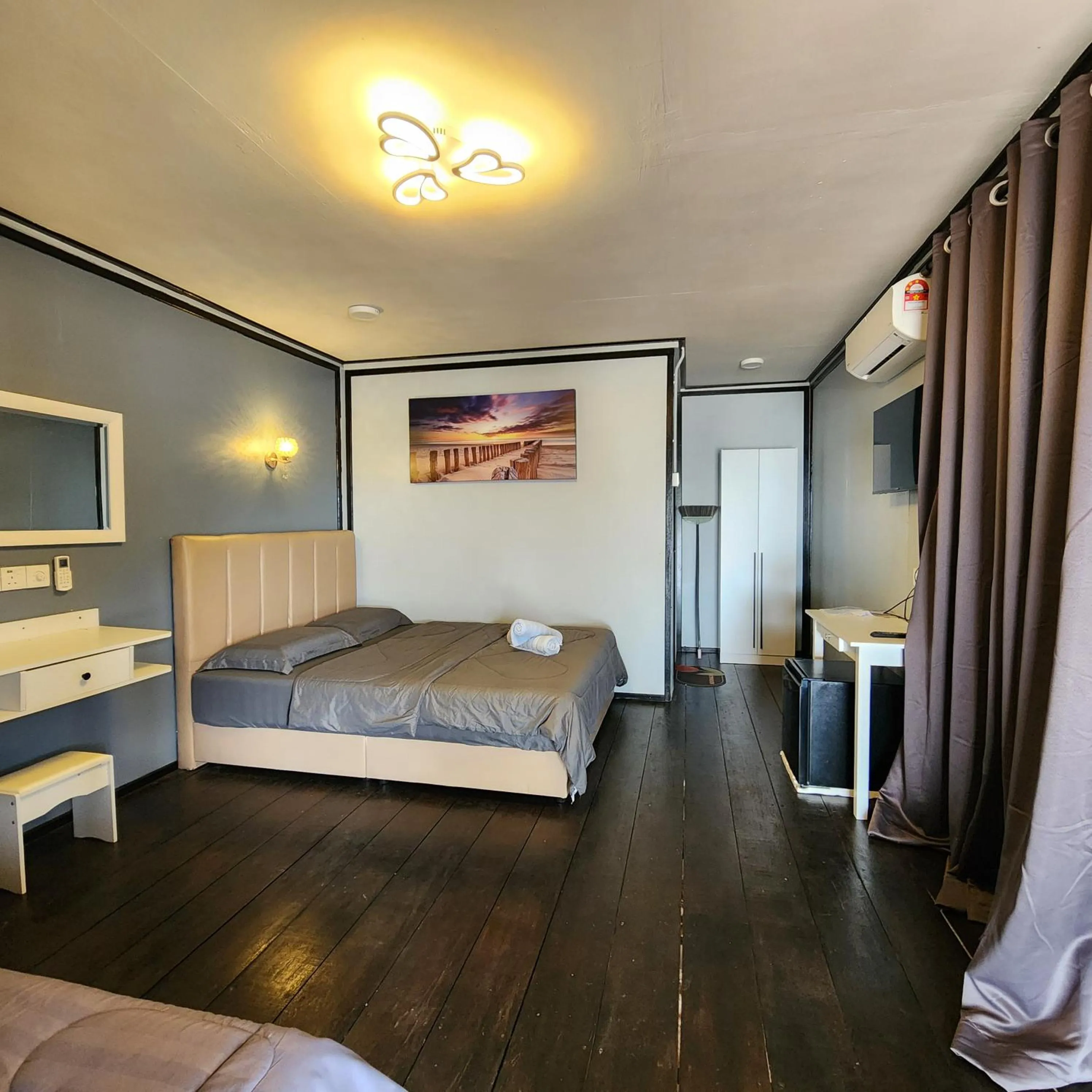 Bed in Permai Chalet Tioman