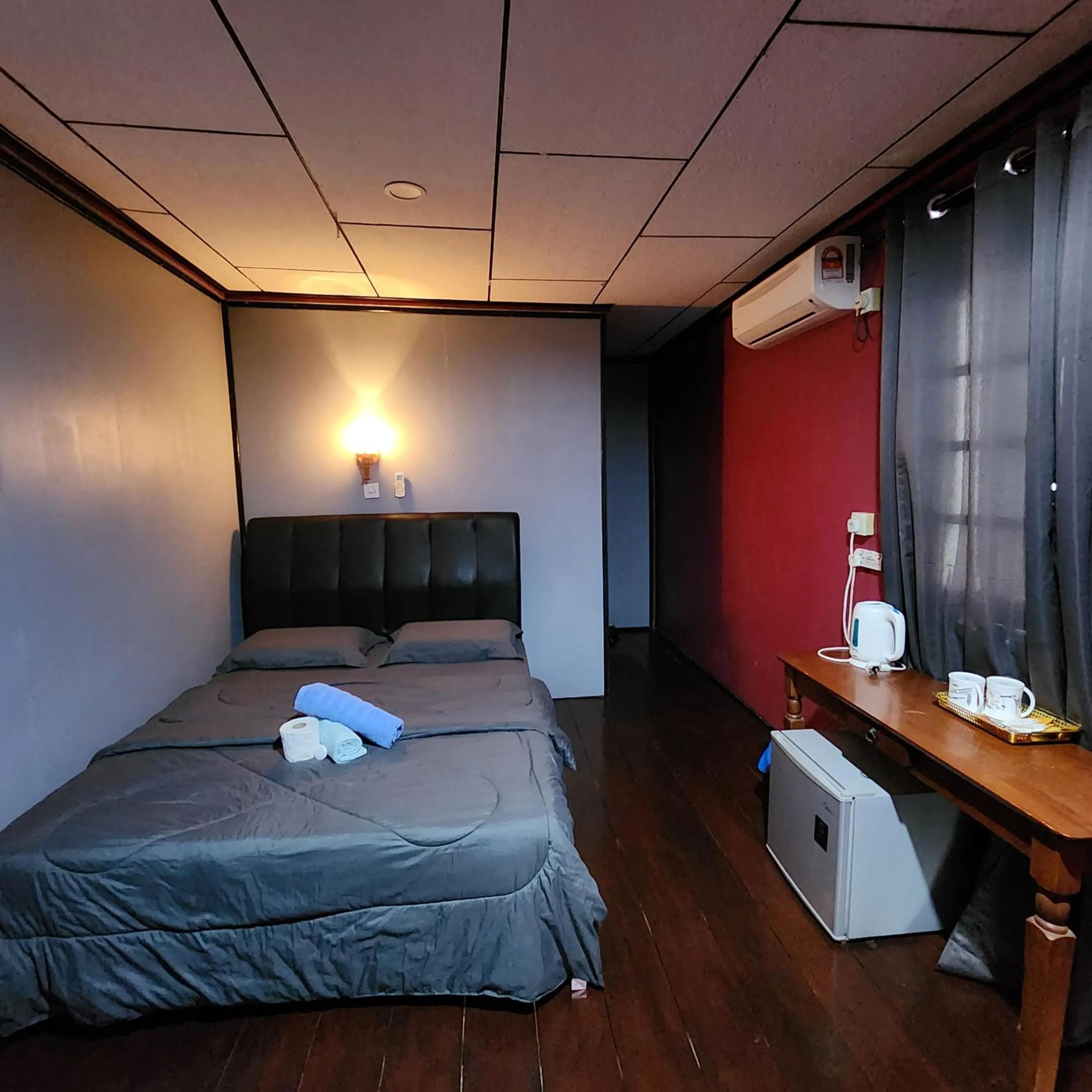 Bed in Permai Chalet Tioman