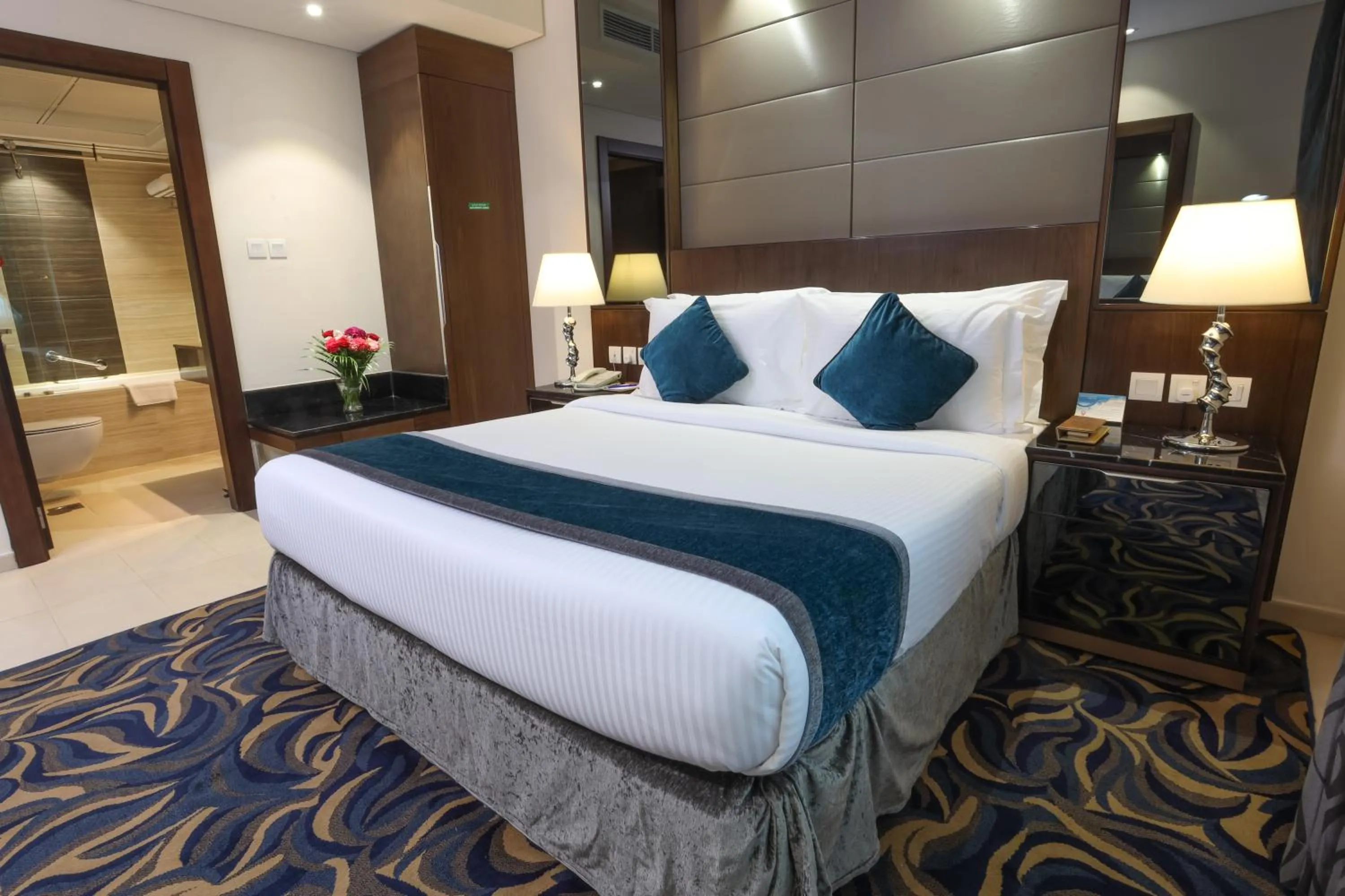Bed in Omega Hotel Dubai