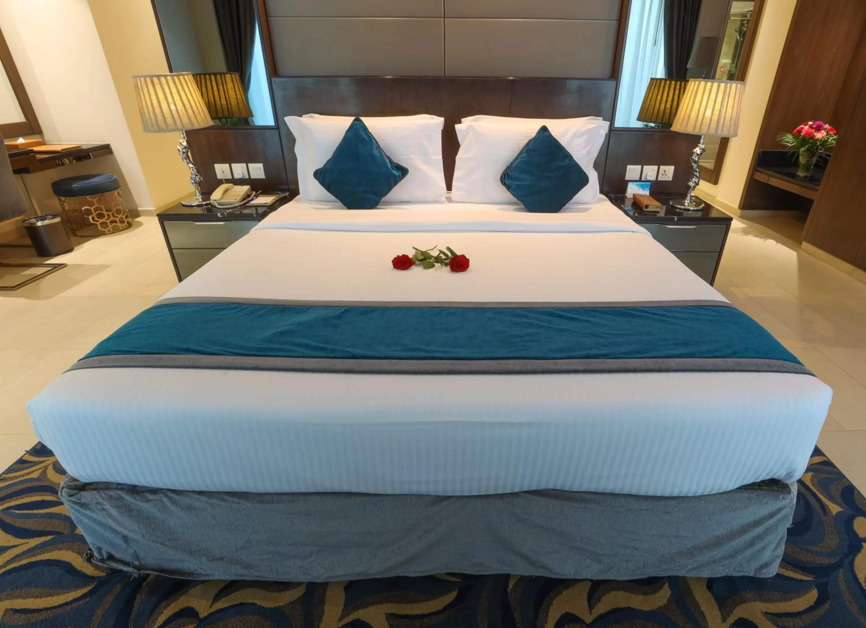 Bedroom, Bed in Omega Hotel Dubai