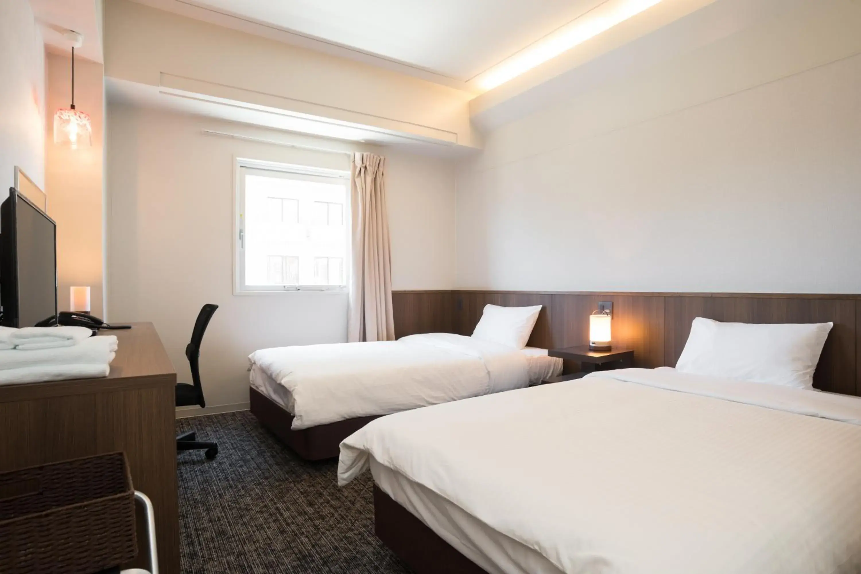 Photo of the whole room, Bed in RJ Hotel Naha Photo of the whole room, Bed in RJ Hotel Naha