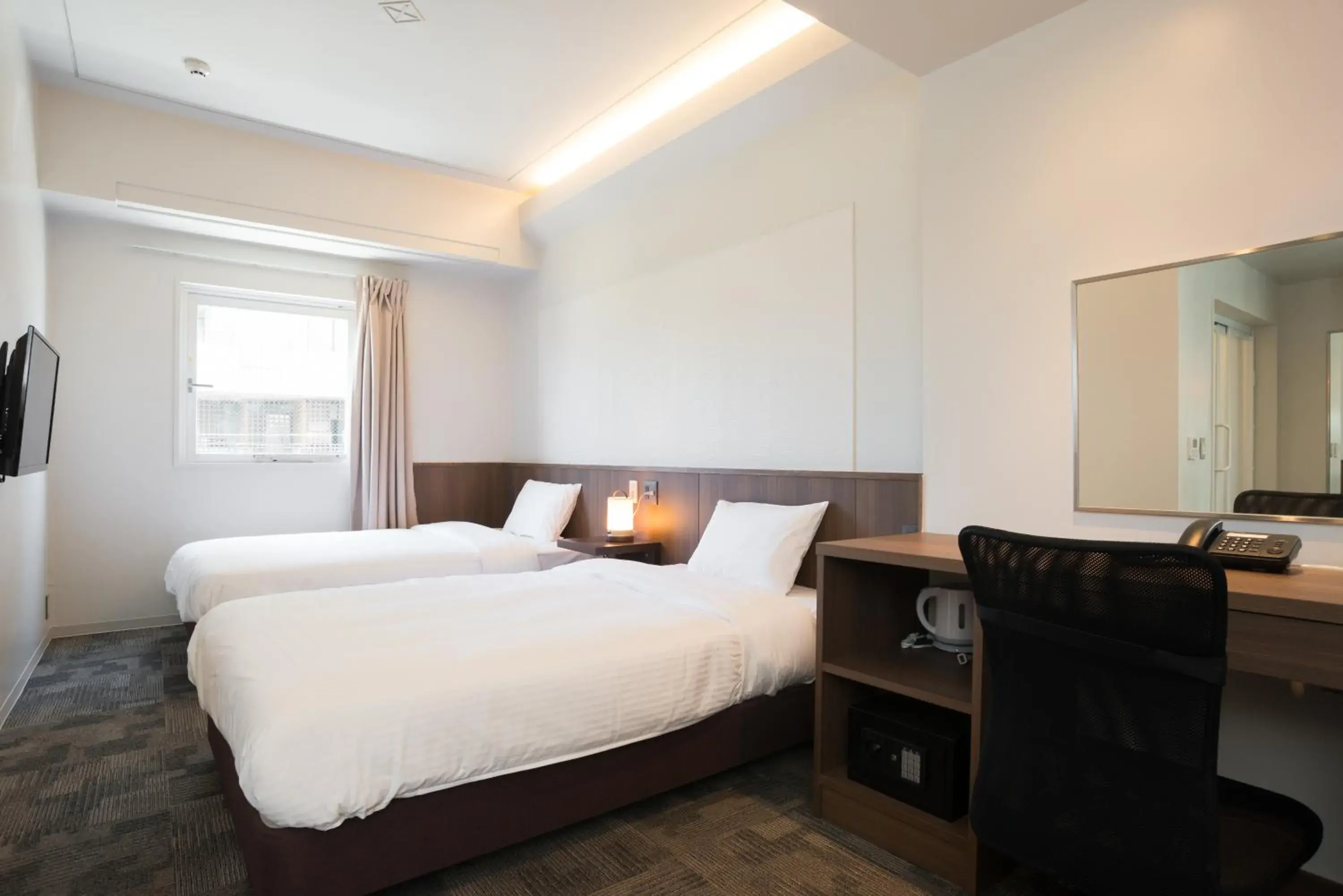 Photo of the whole room, Bed in RJ Hotel Naha Photo of the whole room, Bed in RJ Hotel Naha