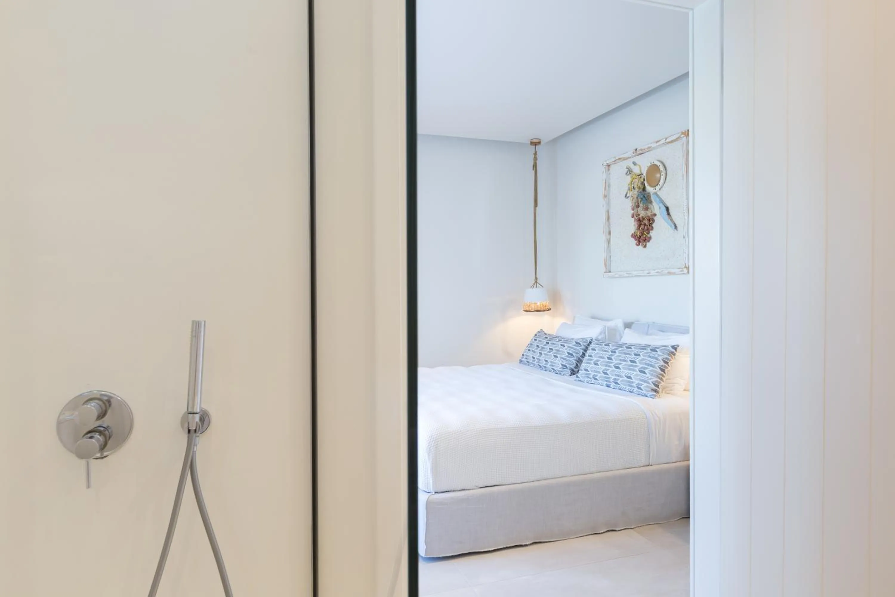 Bed in 18 Grapes Hotel